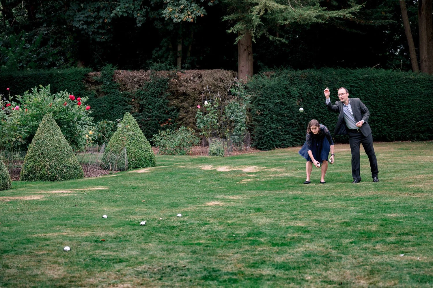 Wedding guests play boules at Hutton Hall in Essex