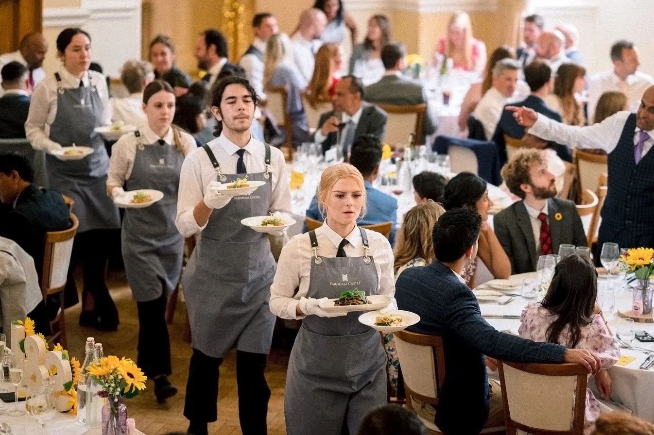 Wedding breakfast served at Farnham Castle photographed by Uxbridge wedding photographer Steve Bagness