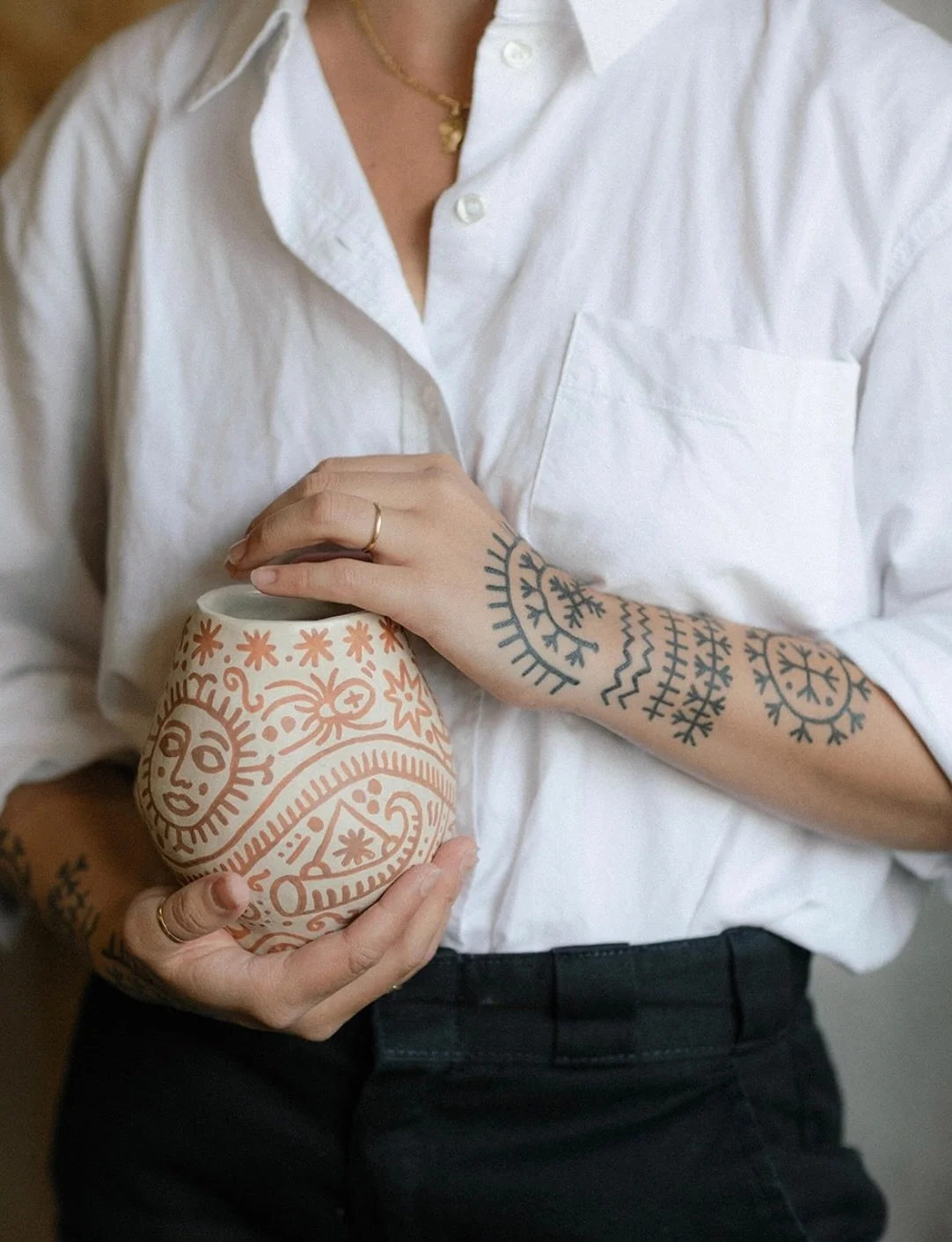 The Croatian protection tattoos now on my arms and hands sparked a curiosity to explore their language through clay. I created two vessels for Treubhan to design, carrying that ancient rhythm of marking from skin to earth. Thank you Mark @threespiral