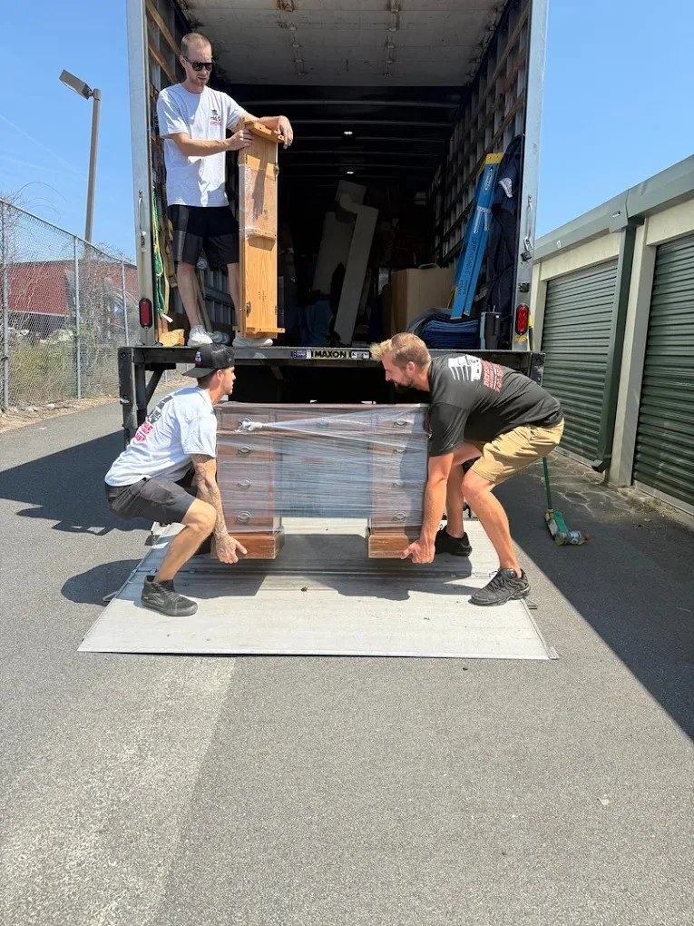 moving desk out of moving truck 