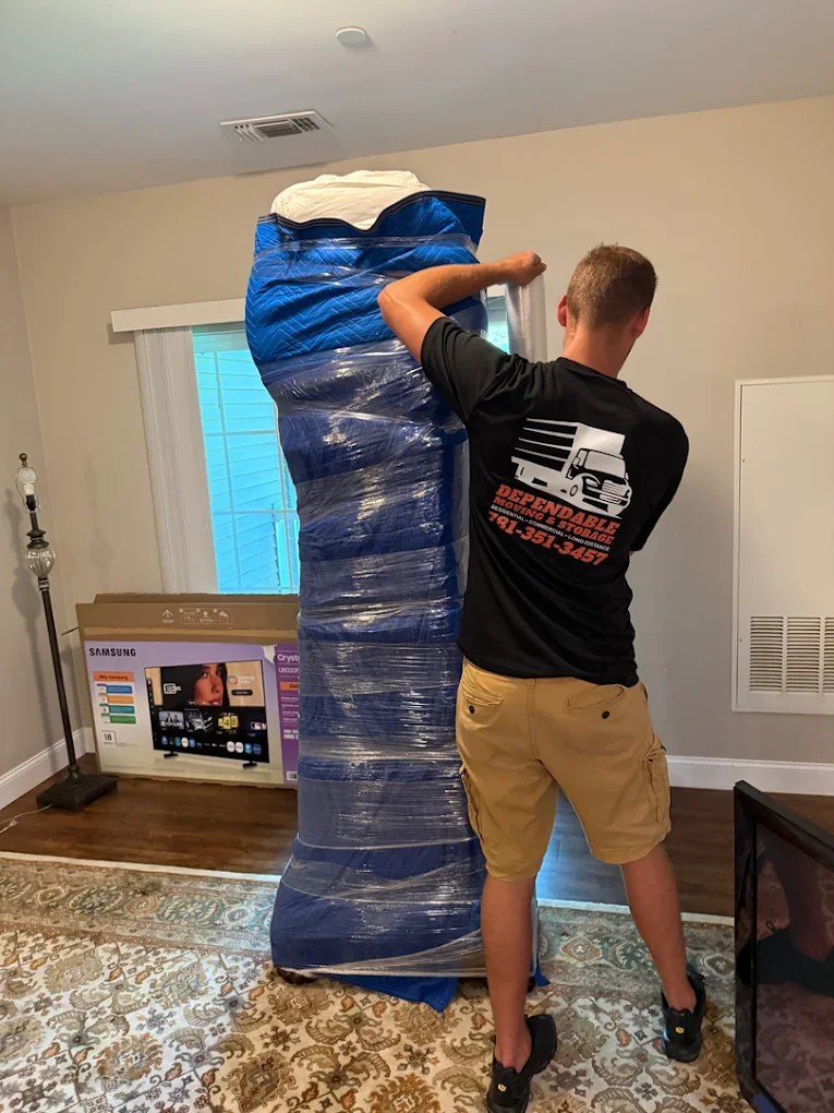 Dependable Moving worker packing up things to move