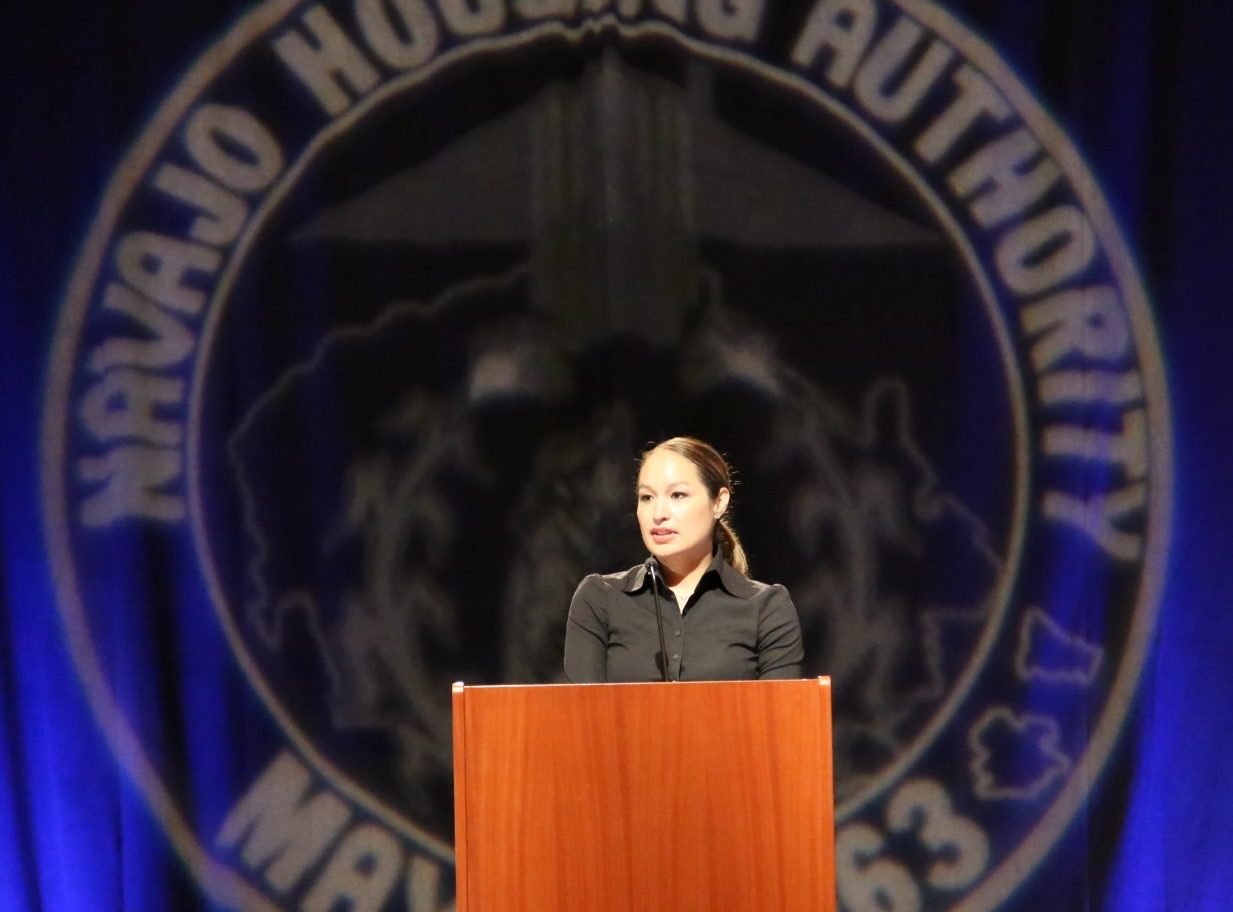 Carmen-Davis-speaking-at-the-Navajo-Housing-Authority-conference-e1613945280426.jpg