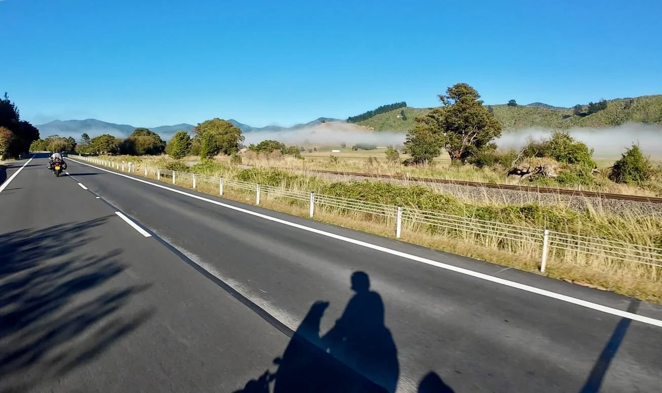 A gentle roll out of Picton set the tone &mdash; cool air, low cloud draped through the valleys, and that fresh after-rain smell rising off the road. Vineyards gave way to coastline, the sea shifting from turquoise to deep blue, before we turned inla
