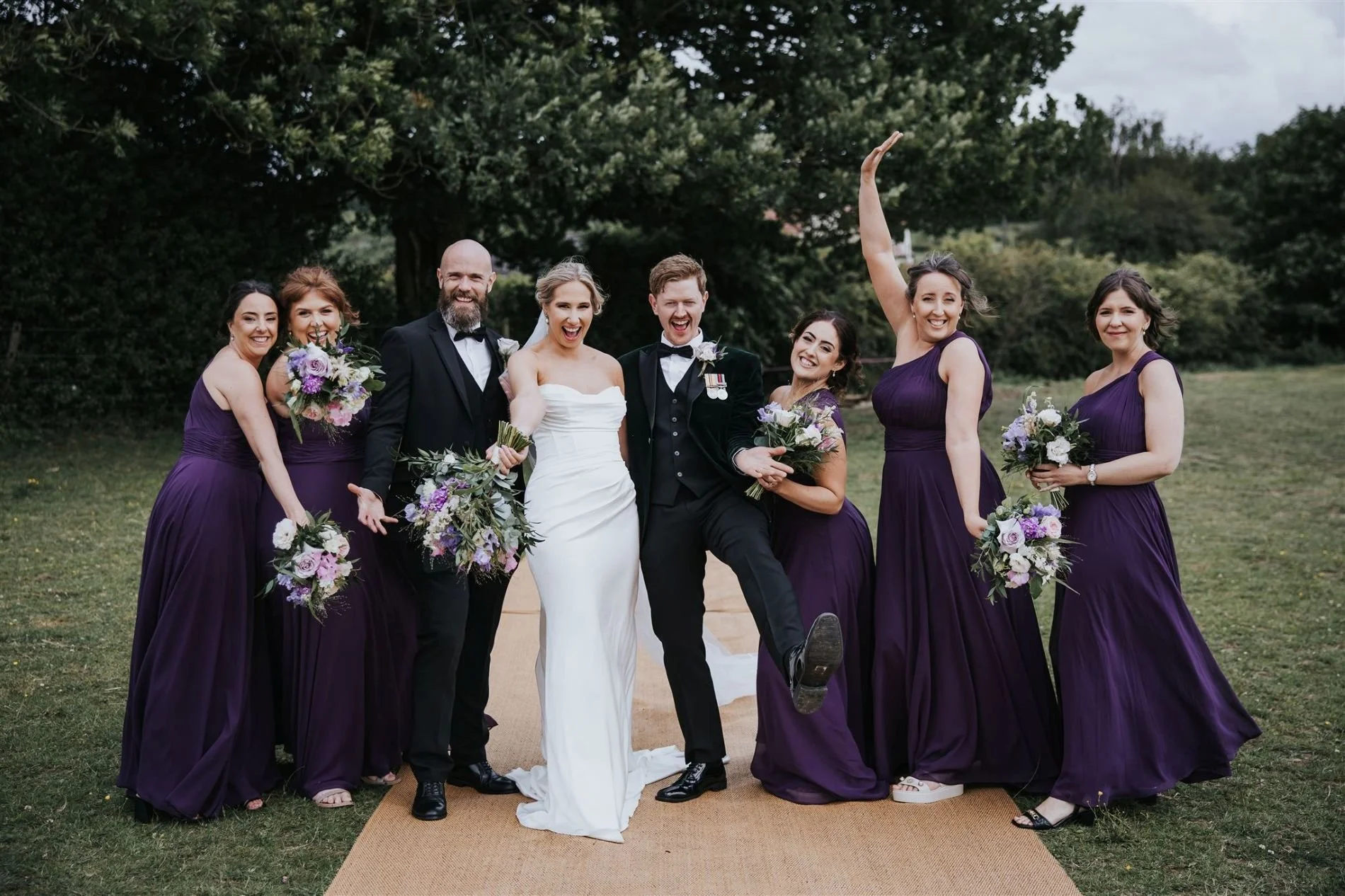 Bride groom and bridesmaids outdoor photo