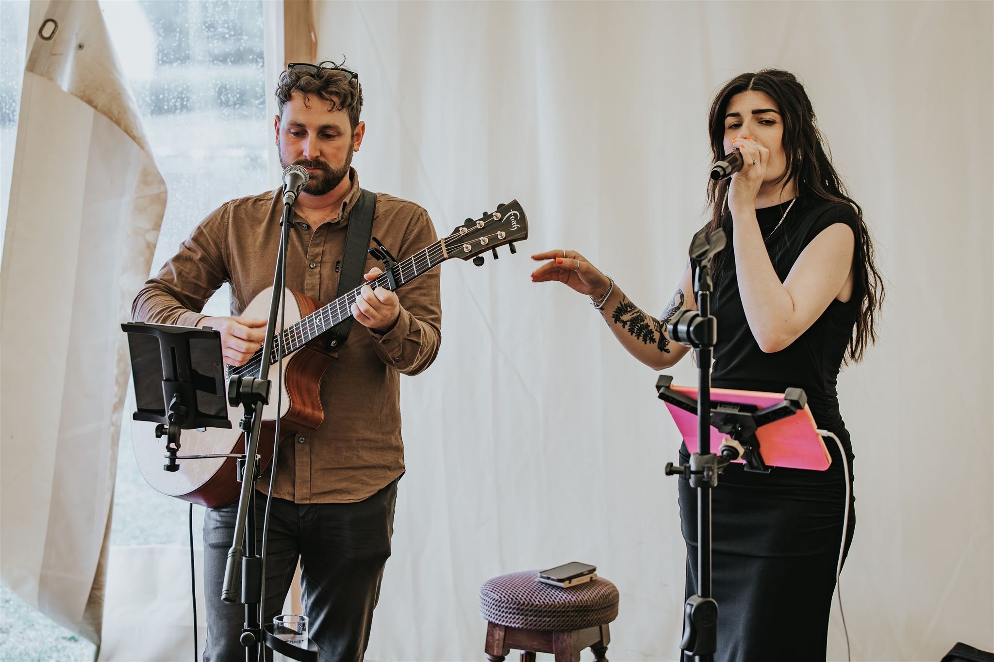 Live music due performing at marquee wedding