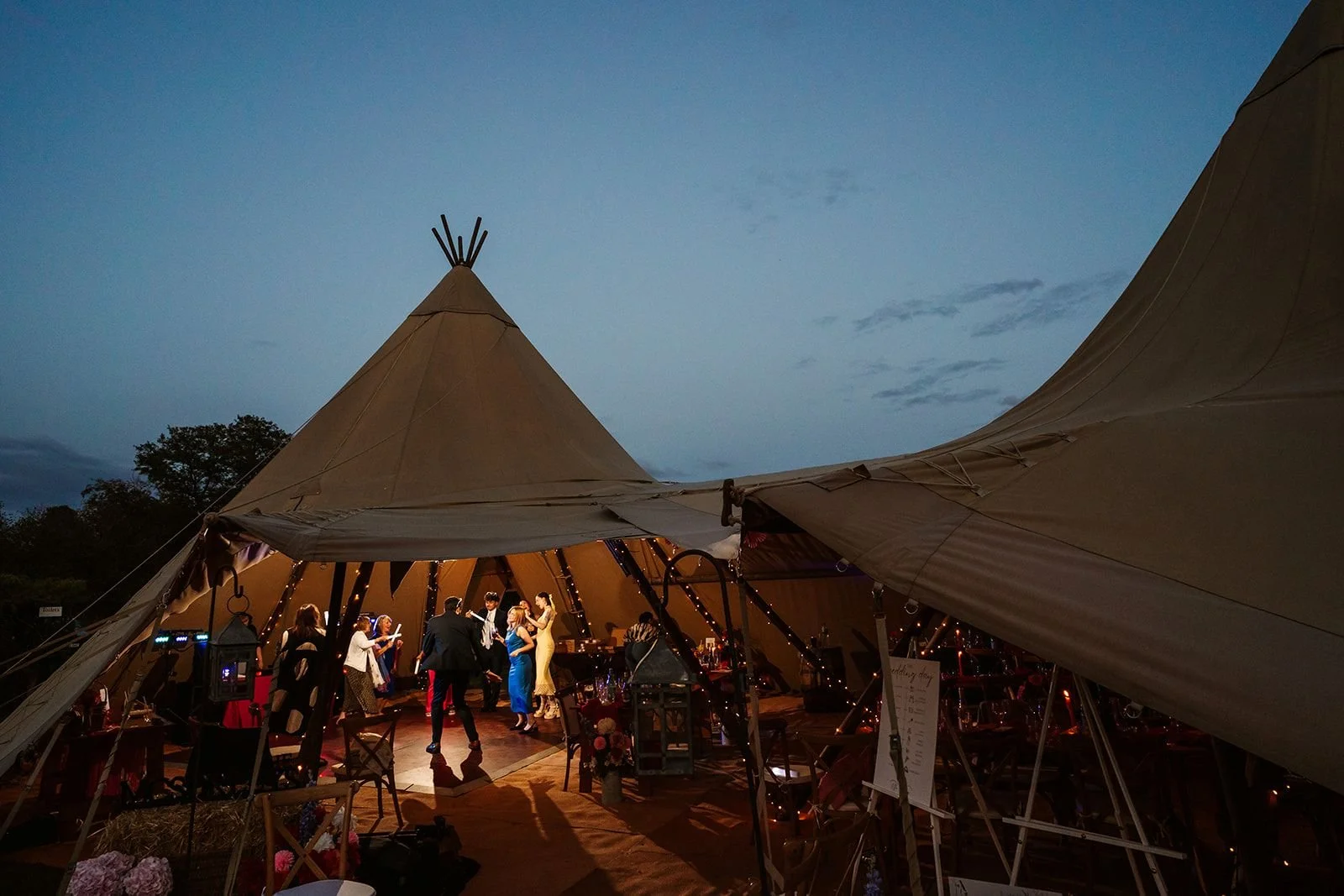 tipis at night after a tipi wedding