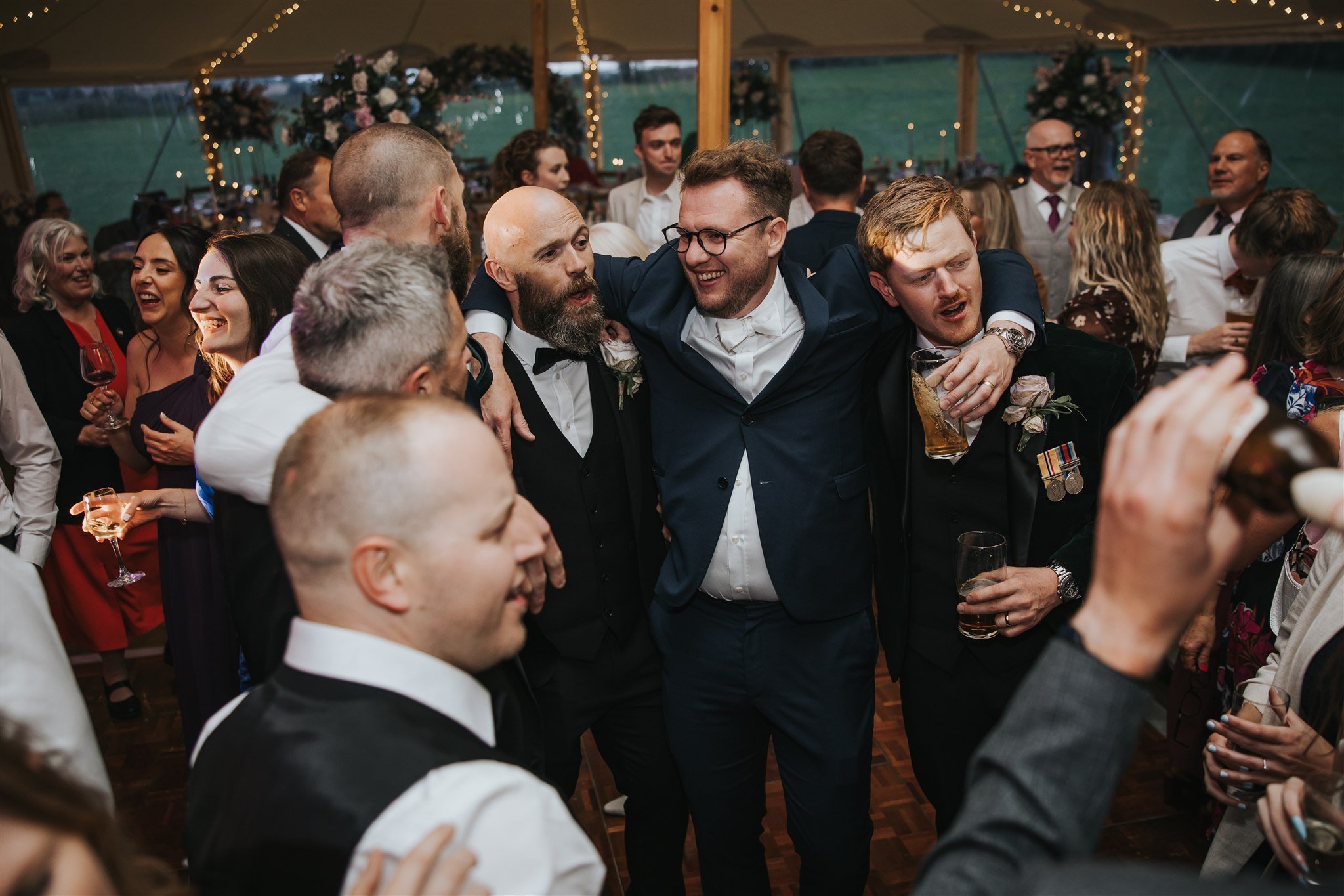 wedding guests on the dancefloor at marquee wedding