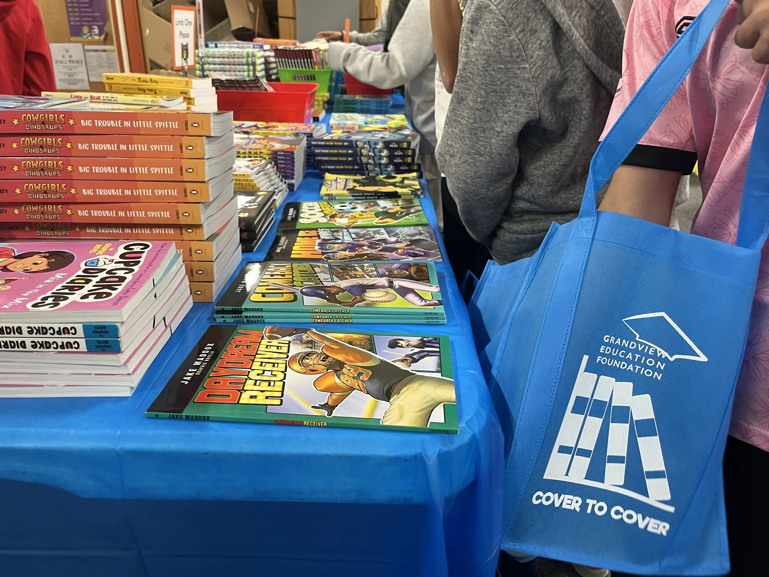 Cover to Cover summer reading book distribution in the Grandview C-4 school district.