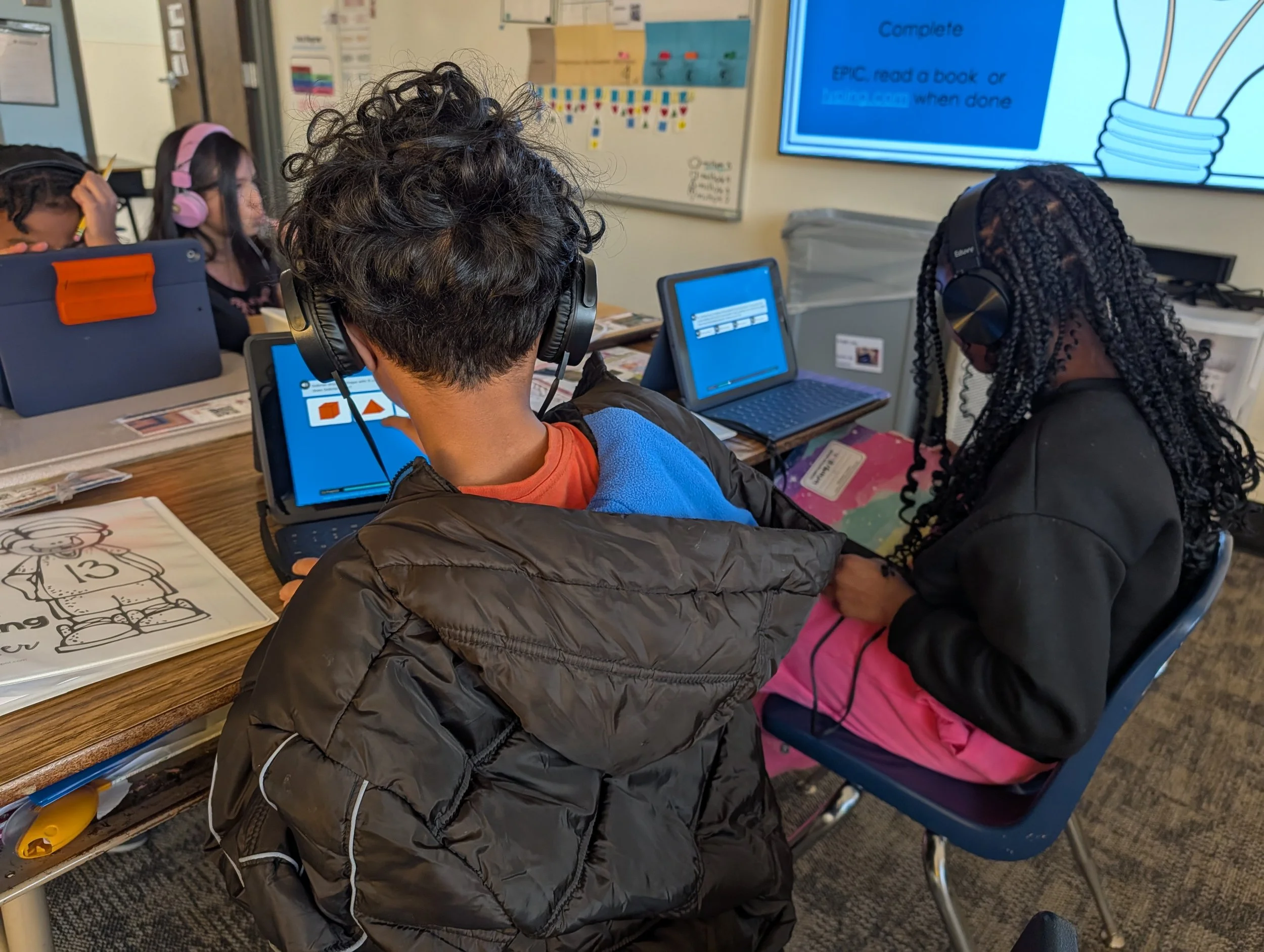 Conn-West students enjoying new classroom headphones.