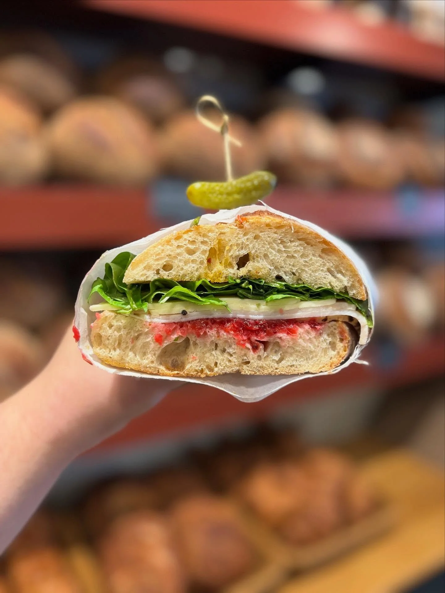 Sandwich Day!!! 

Housemade cranberry relish, arugula, cheddar, and harissa with either turkey or tofukahn. Come and get em!