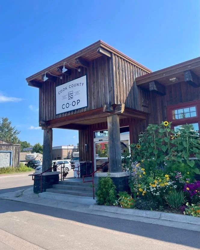Sharing another co-op success story today! We visited Cook County Co-op in Grand Marais, Minnesota. The co-op was founded in the 1960&rsquo;s but opened its first storefront in 1976.  In the early days, they were a buying club where volunteers drove 
