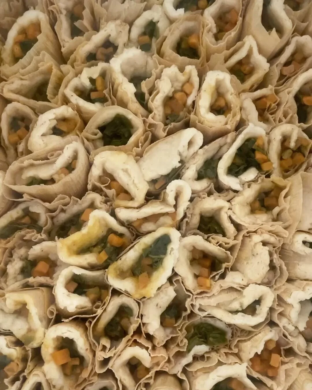 In all, we knocked out nearly 40 dozen (vegan) tamales yesterday and today. Thanks to @ymboudreaux for the shopping run!  Using homegrown #acelgas w/camote, rajitas de chile poblano, jackfruit tinga, and cashew cheese.