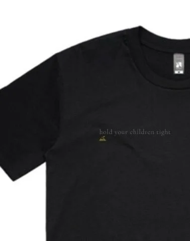 Put a line from the EP on a t-shirt.

&ldquo;hold your children tight&rdquo;

Felt like it deserved to live somewhere beyond a song.

All proceeds go to Schools for Nepal &mdash; helping build schools and support kids who need it most.

Simple idea. 