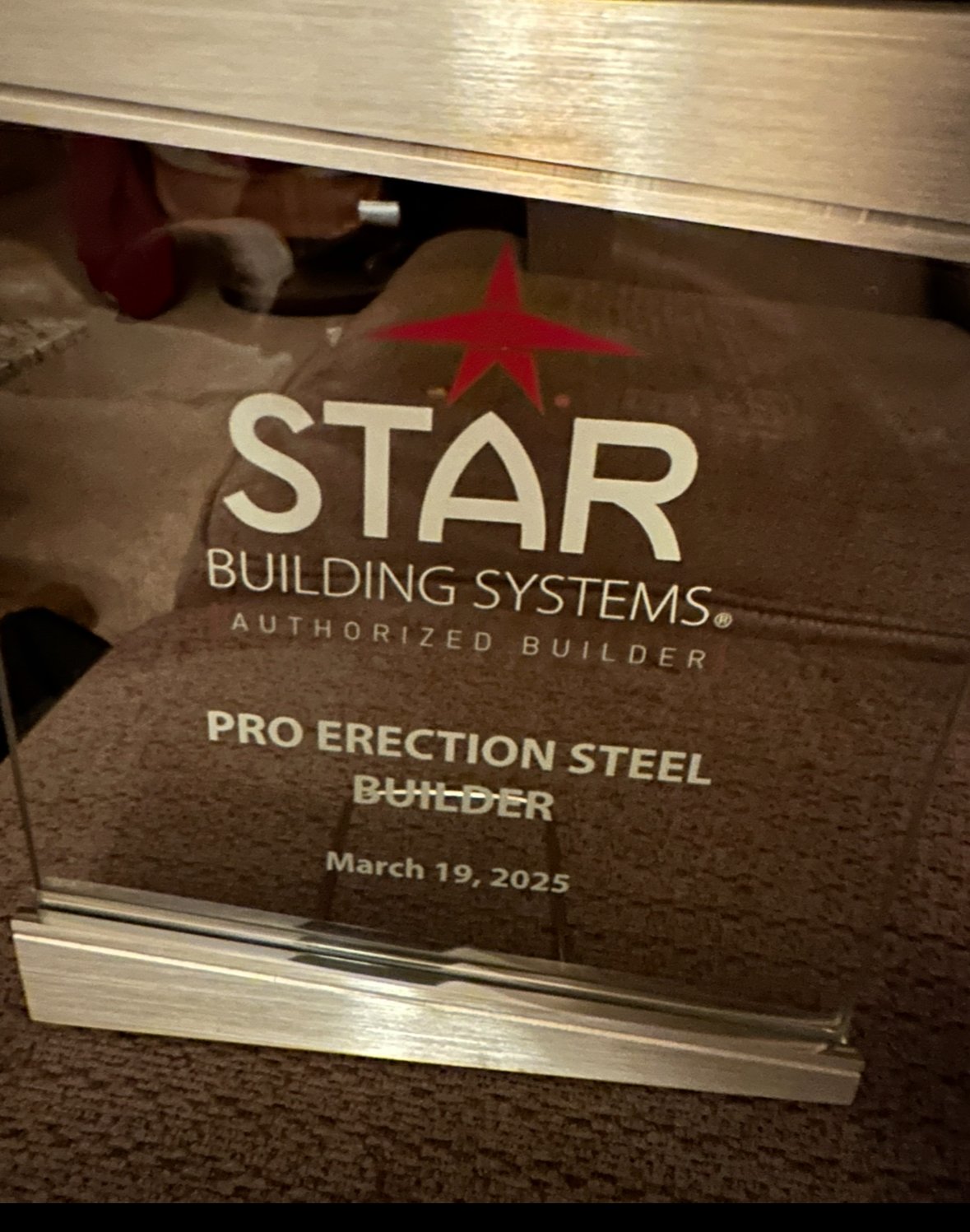 Star buildings authorized dealer plaque  showing completion in march 2025