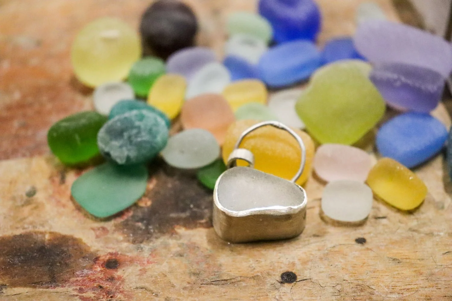 A pile of beautiful coloured sea glass ready to be made into jewellery