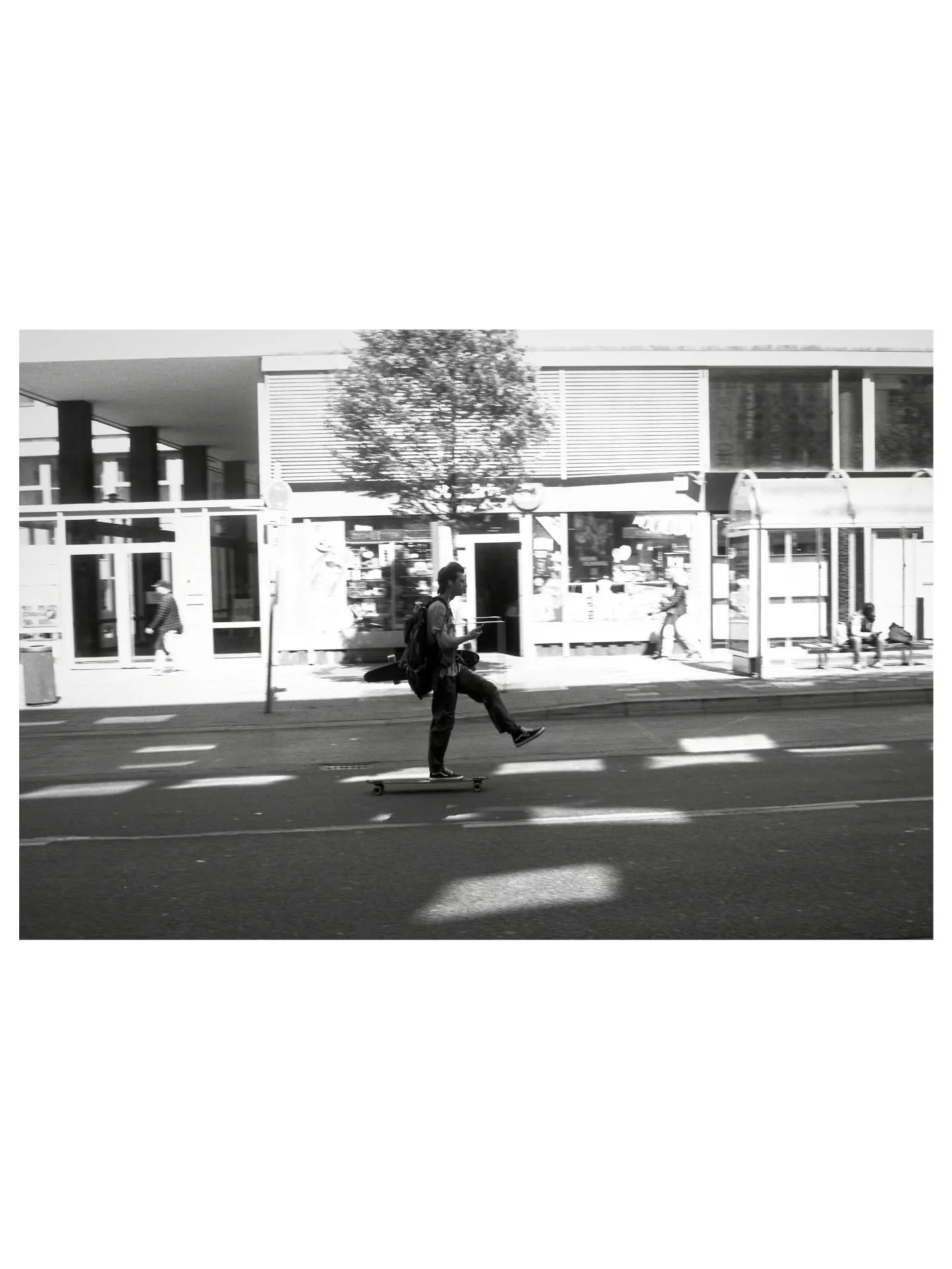 Took a photo of this guy cruising on his longboard at Friedrich-Ebert-Stra&szlig;e. He approached me afterward and asked if I got the shot. I answered that I'm not sure, because it&rsquo;s on film.

He let me try his longboard, and I pretended I didn