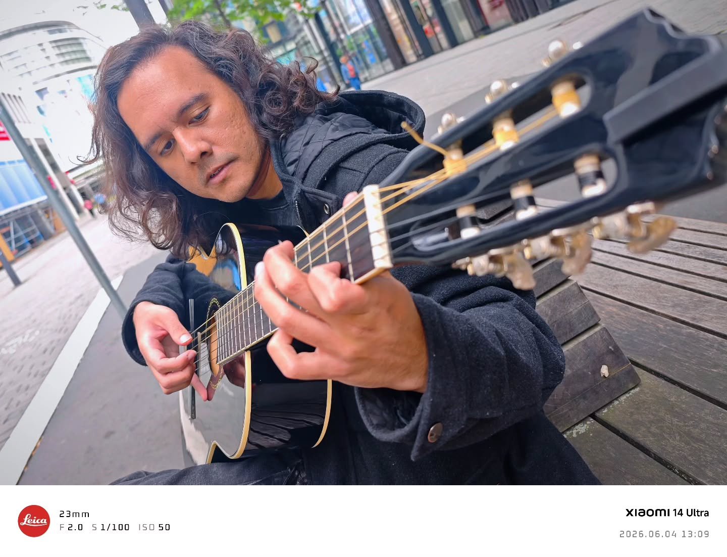 Trying to take a photo every day. This is day 6.

Today is a public holiday celebrating the Eucharist. The weather is chilly, and the clouds are not in the mood.

I saw this guy sitting with his guitar, strumming away with a little jazzy sound on the