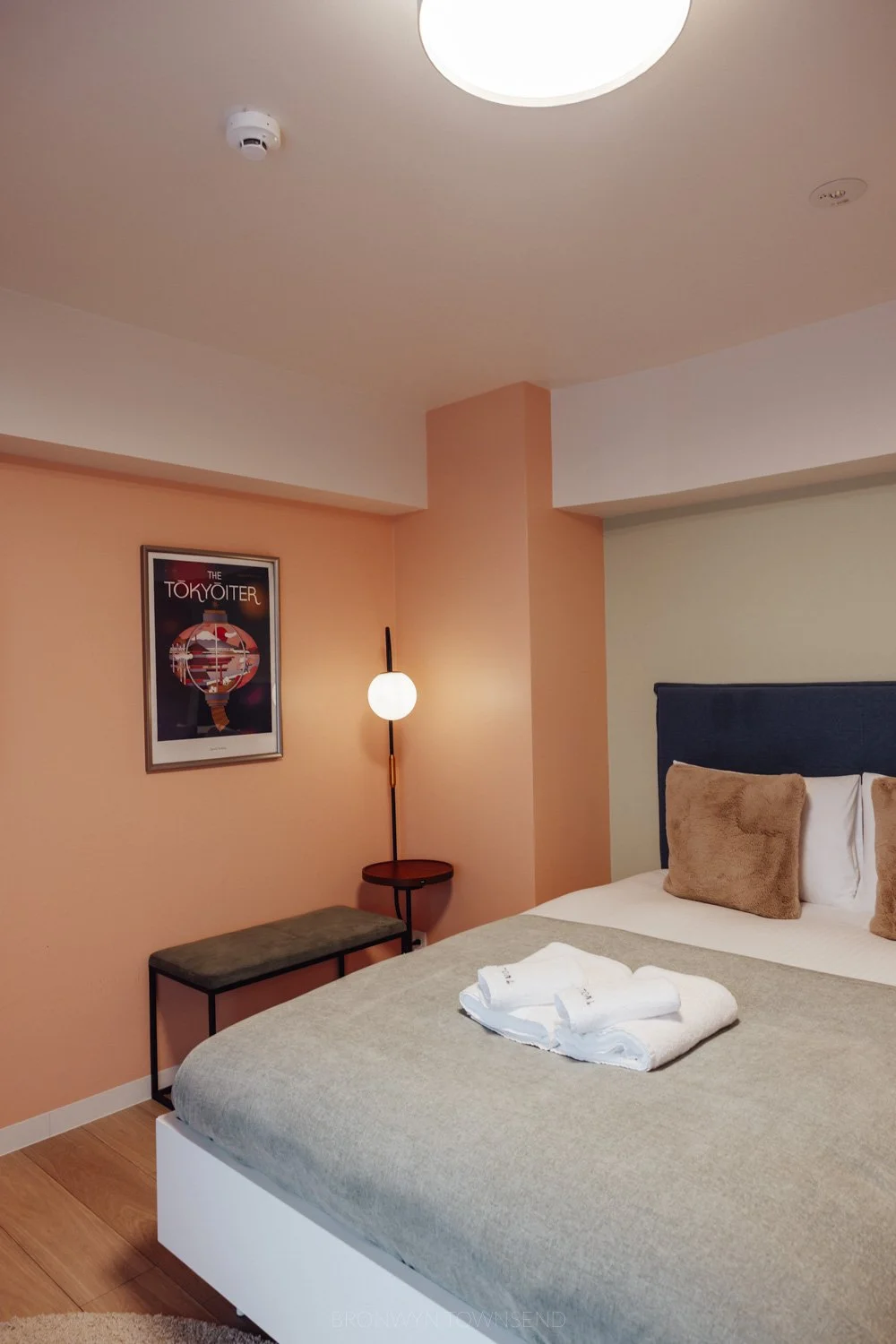 peach and sage coloured bedroom at Section L Hamamatsucho