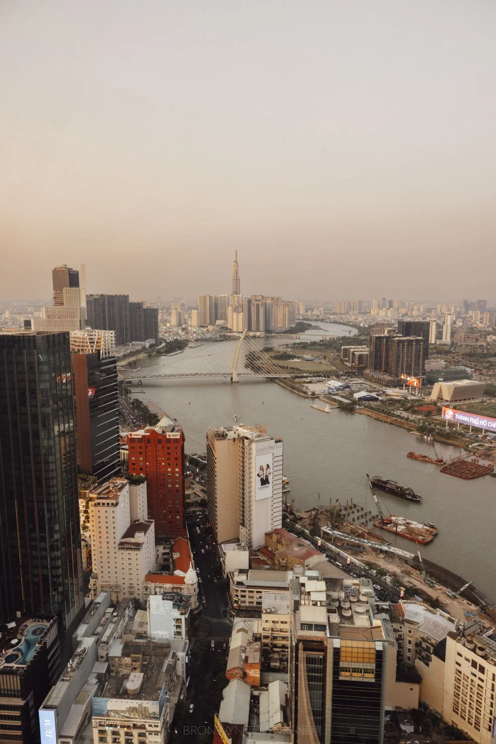 view over the city and saigon river in ho chi minh city at sunset