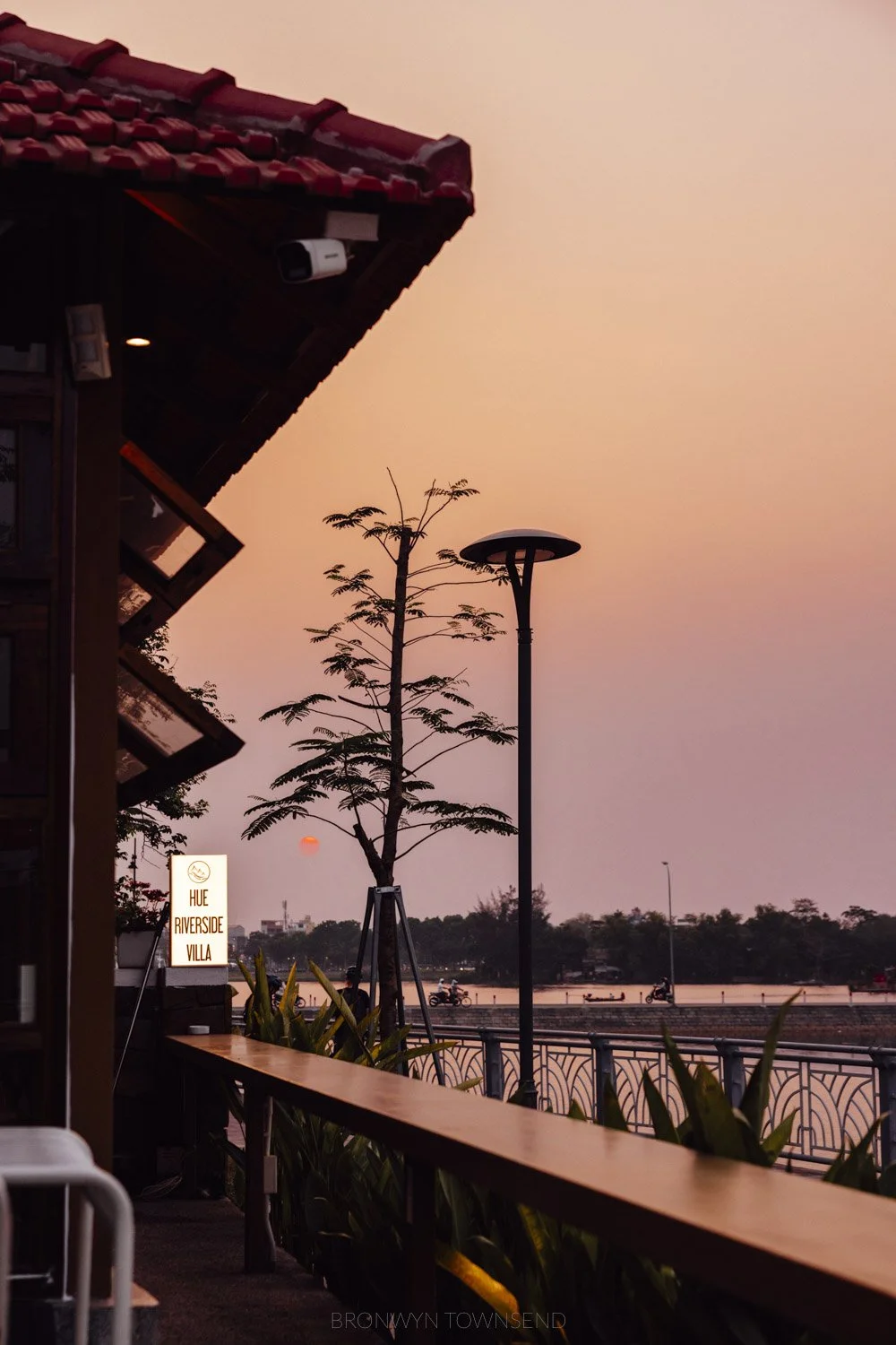 The exterior of hue riverside villa at sunset