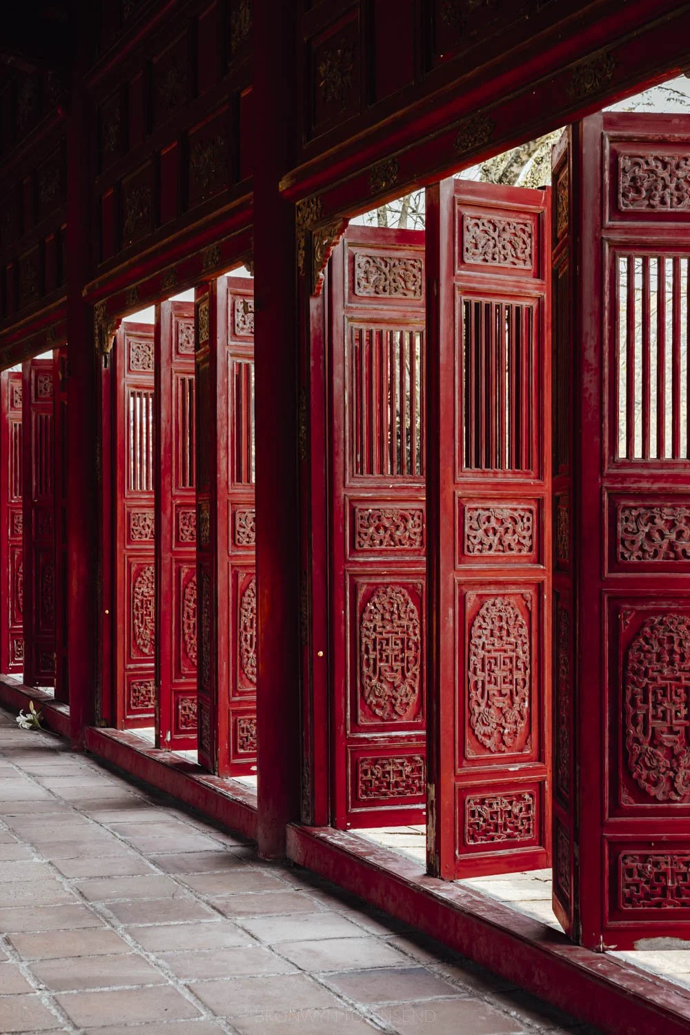 red shuttered door panels at Hue citadel
