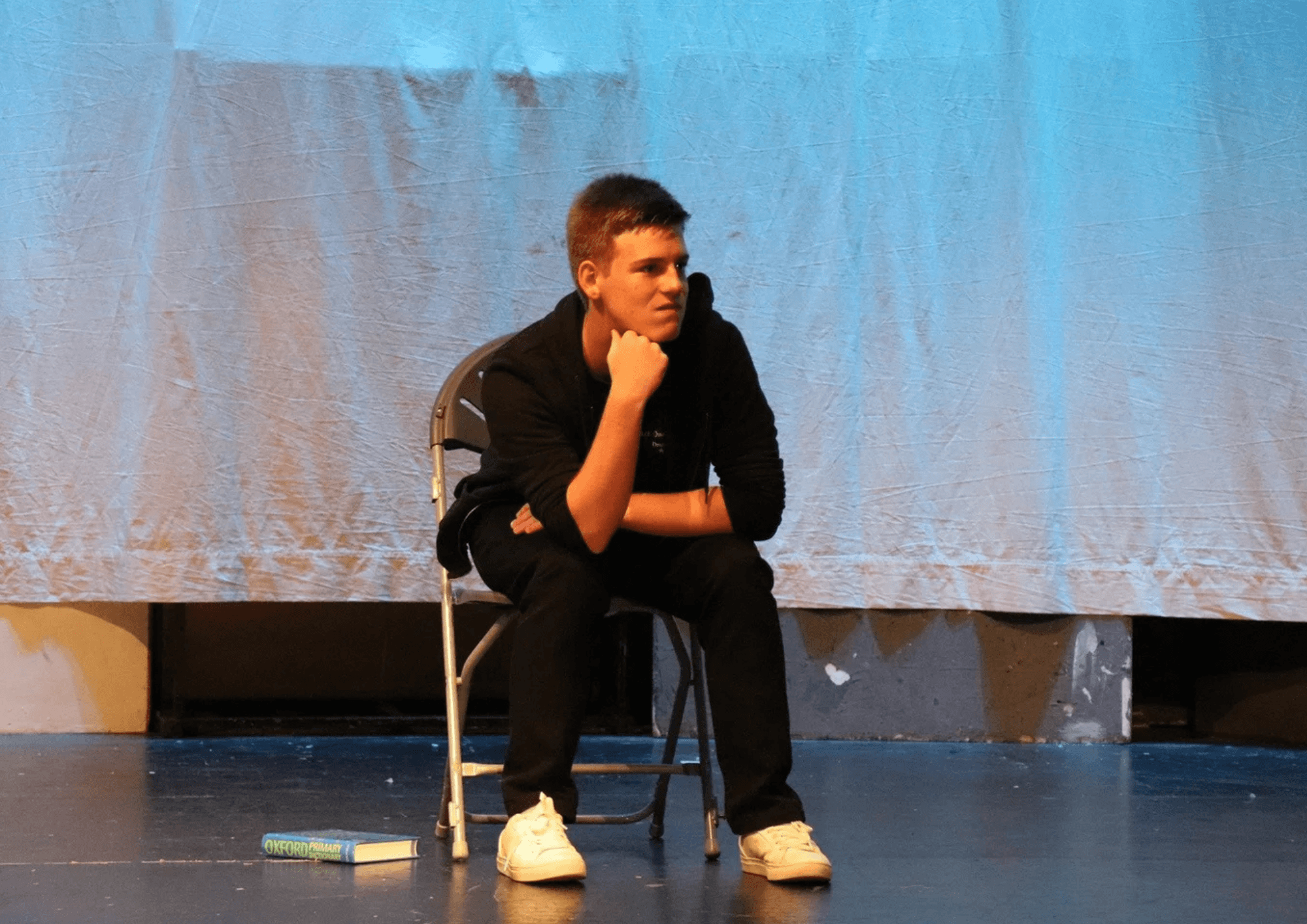 Students rehearsing stage performance skills at Act One Beginners