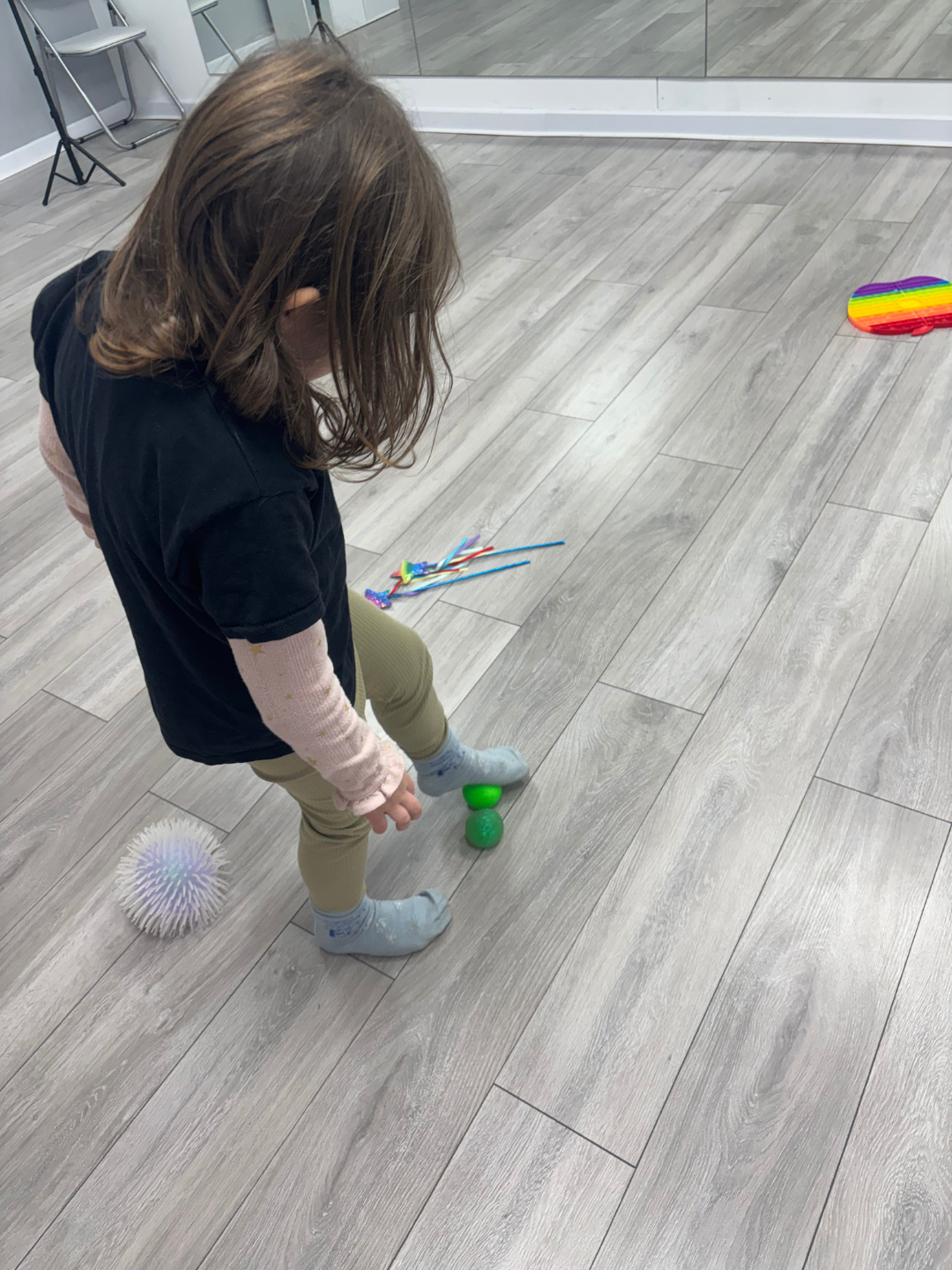 Act One Beginners SEN Drama student playing with ball during inclusive drama class for children with special educational needs East Grinstead Surrey
