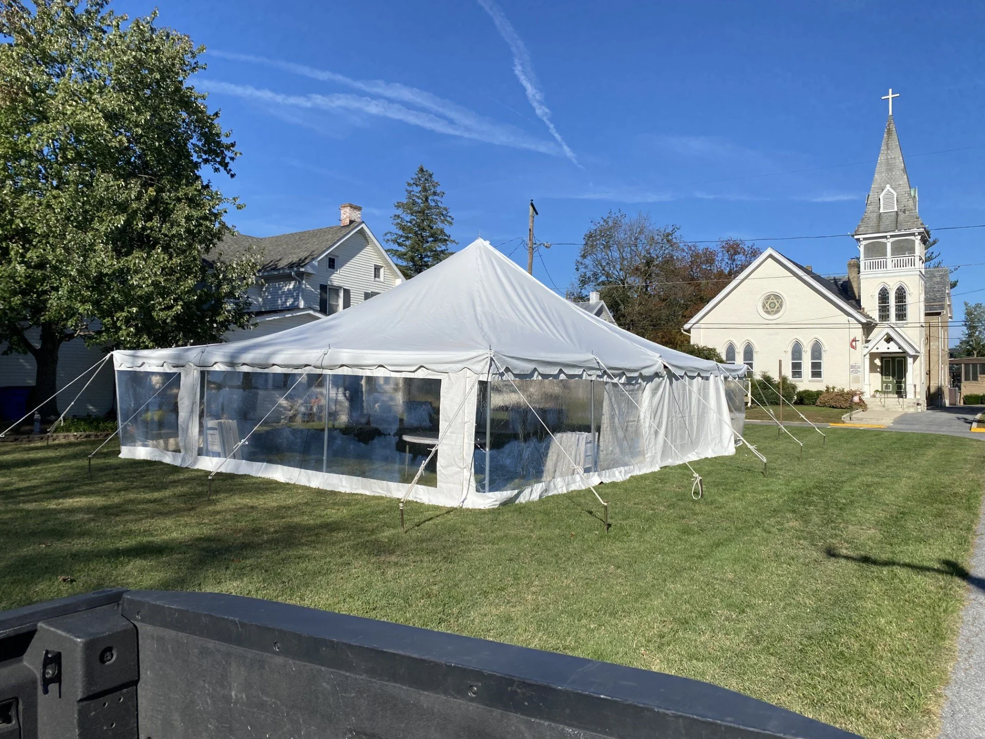30x40 tension pole tent clear sides.jpg