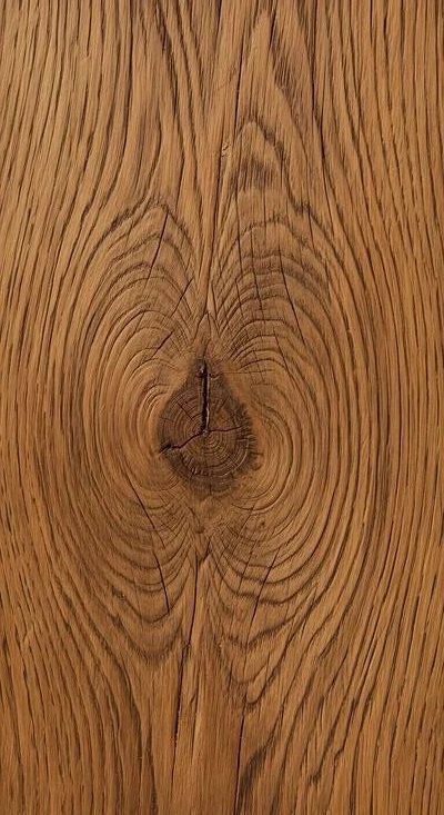 Close-up of a wooden surface showing wood grain and a knot in the wood.