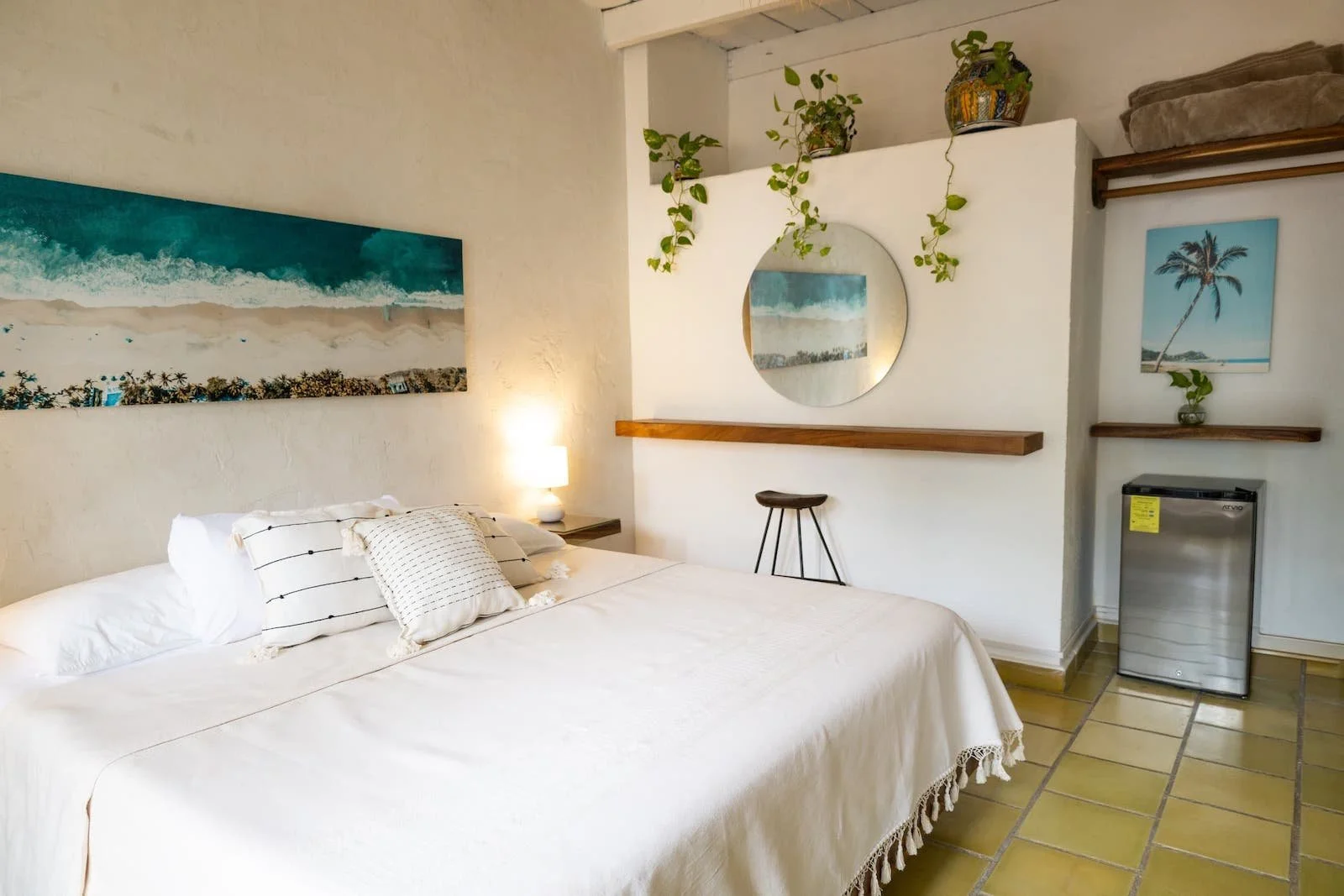 Bright boutique hotel room with natural decor at Hotel Sayulita Central near the beach in Sayulita Mexico.