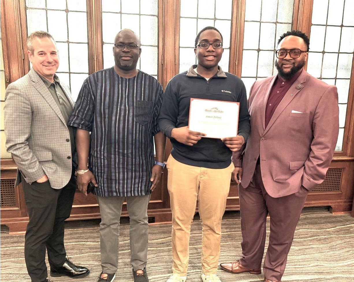 (l-r) Michael Noah, President of BankOnBuffalo, Ebou Jallow, Omar Jallow, Darnell Haywood, Community Responsibility Officer, BankOnBuffalo.