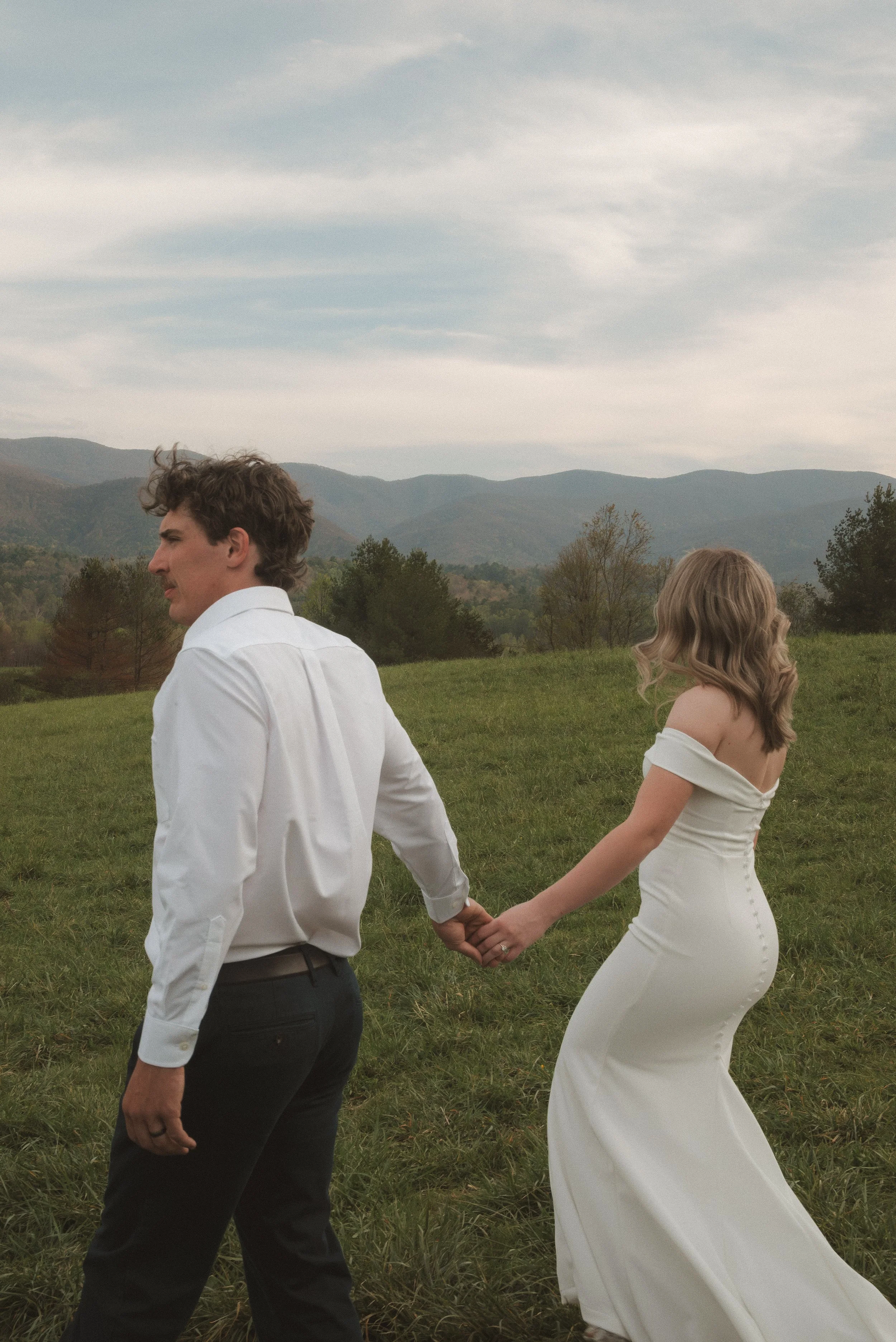 cades cove wedding couple in white dress with mountains