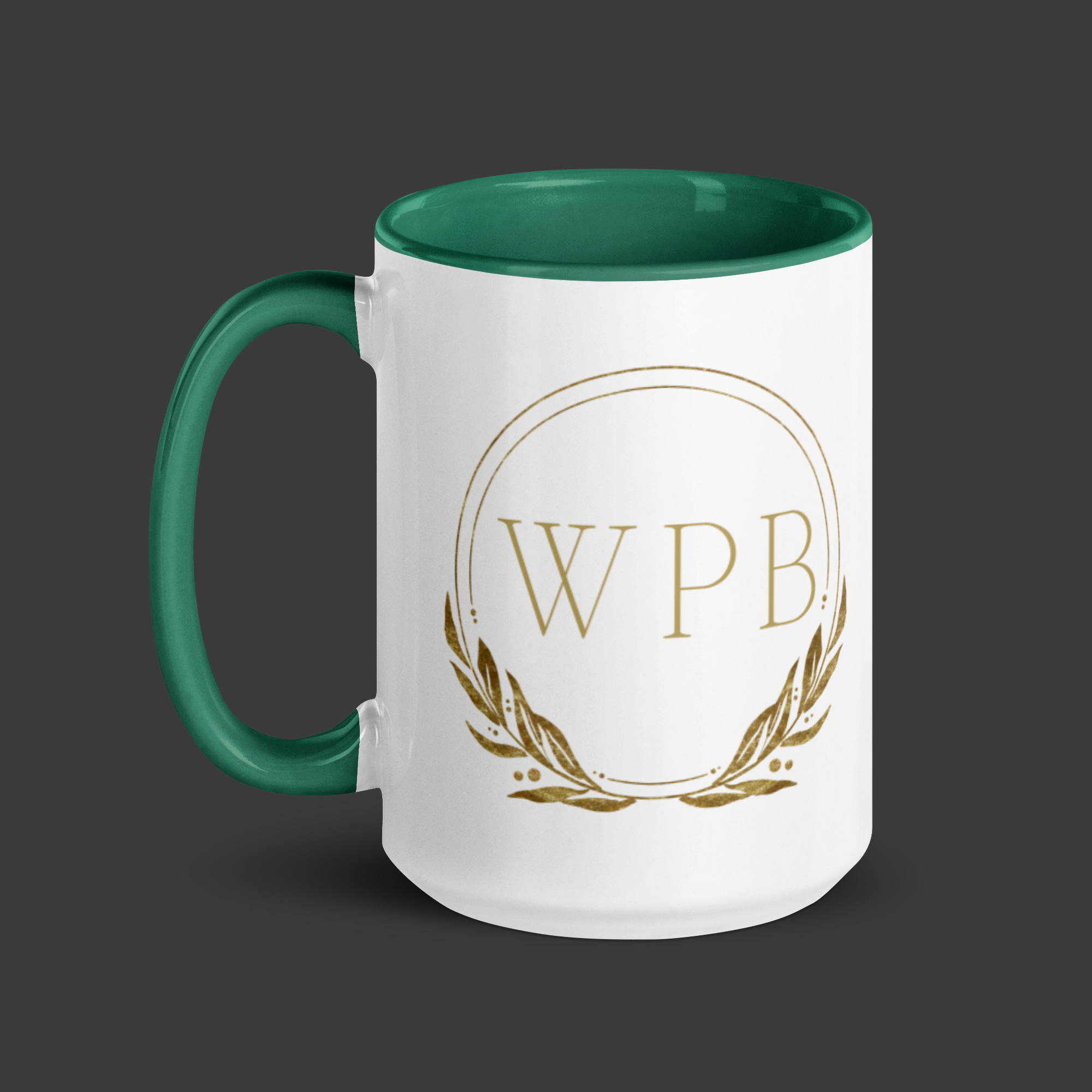 Branded ceramic mug with gold WPB crest displayed on a dark charcoal background for WPB Emporium Home & Lifestyle collection.