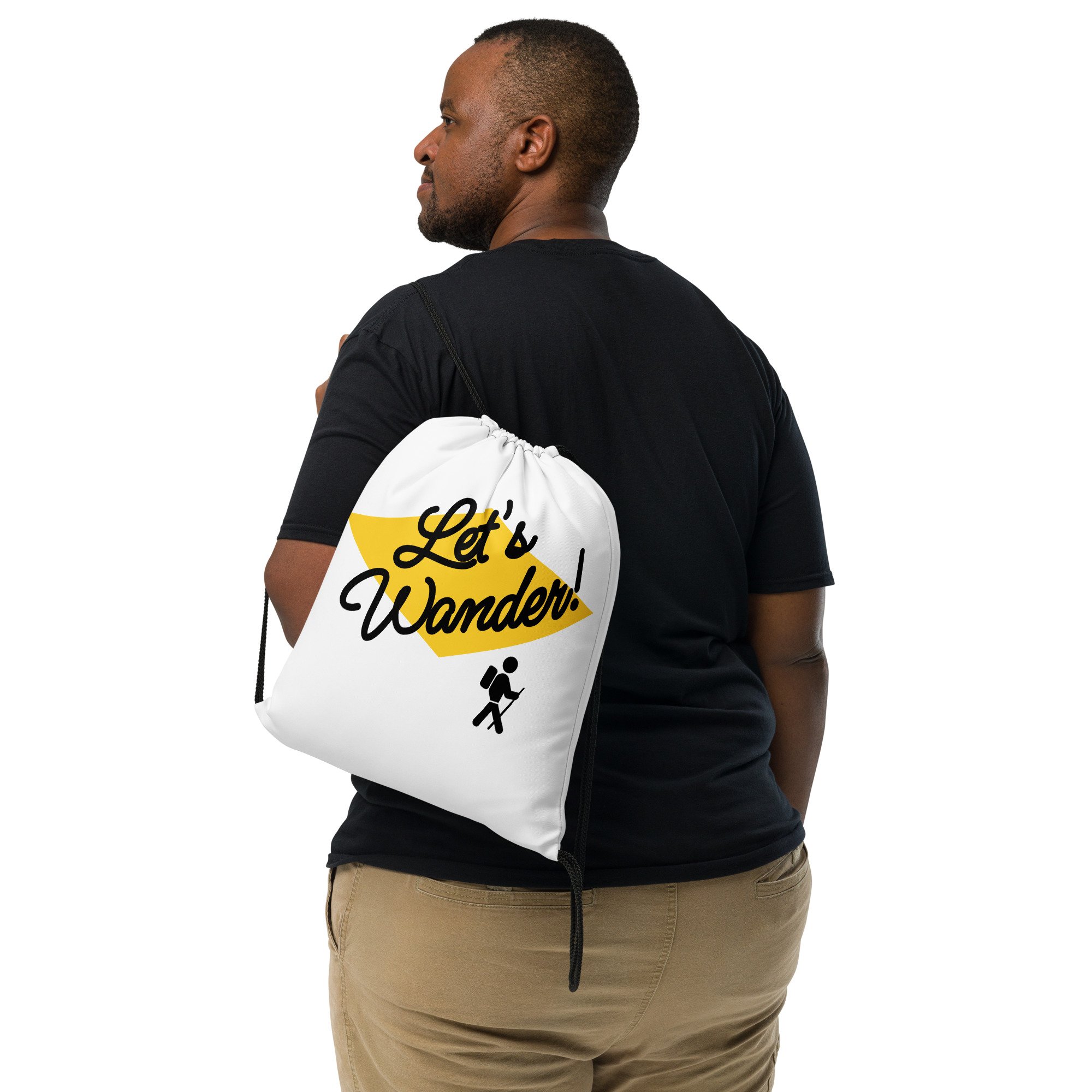 Someone casually wearing Lightweight Drawstring Backpack With Let's Wander/Wanderweg Design for Hiking and Outdoor Activities