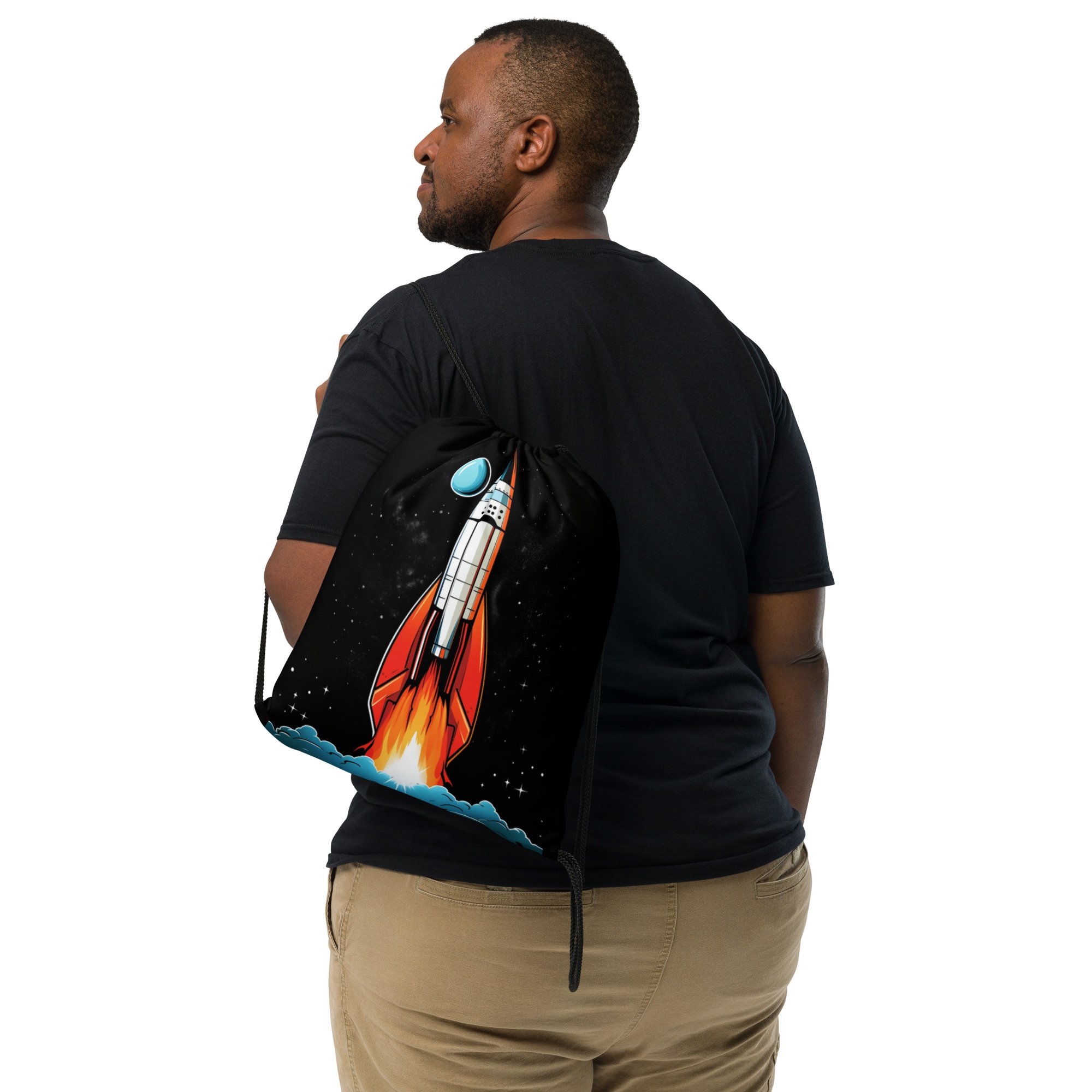 Someone casually wearing Lightweight Drawstring Backpack With Retro Rocket Graphic on Black Background Design for Hiking and Outdoor Activities