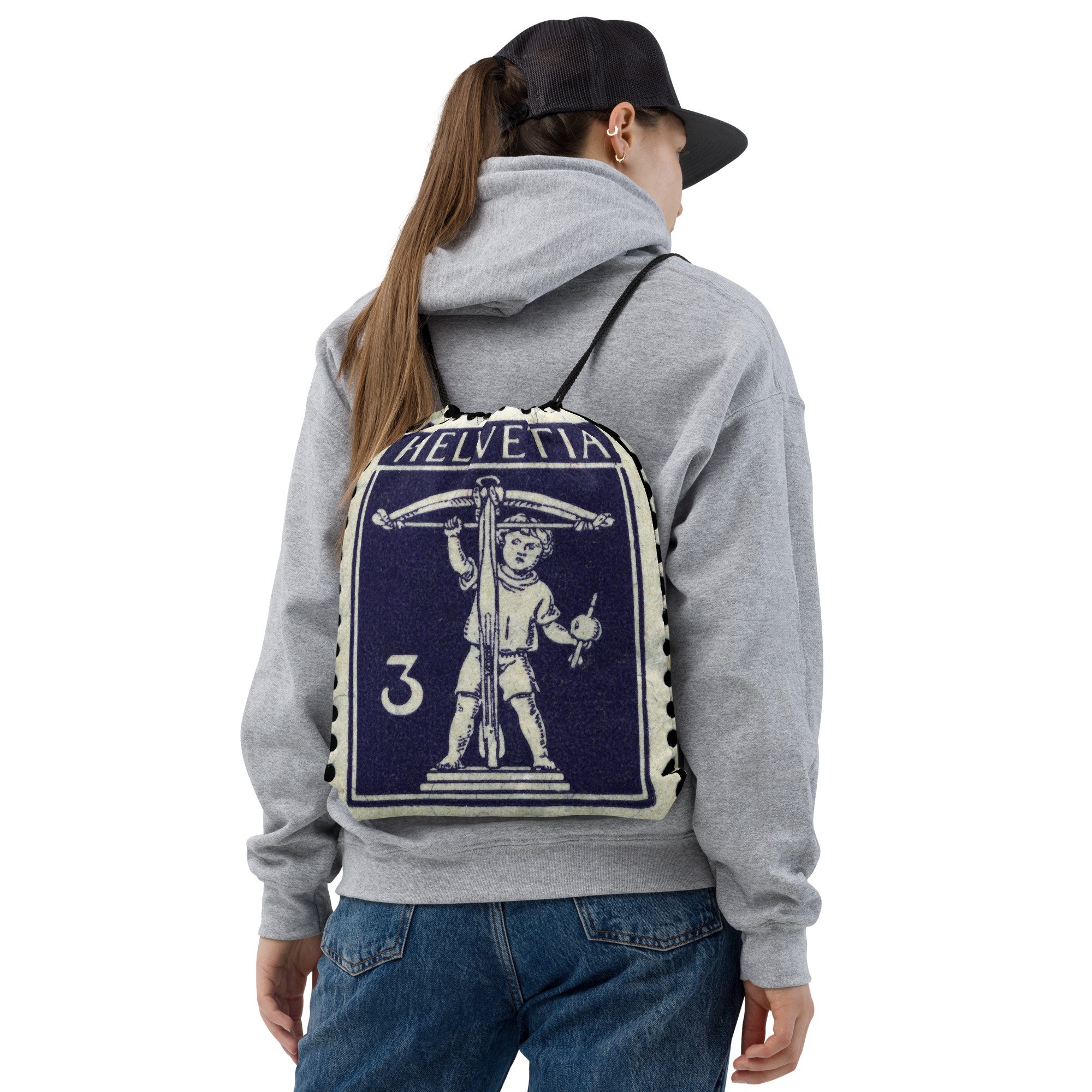 Someone wearing Lightweight Drawstring Backpack With Rare Swiss Stamp Son Of William Tell 3 Rappen Graphic Design for Hiking and Outdoor Activities