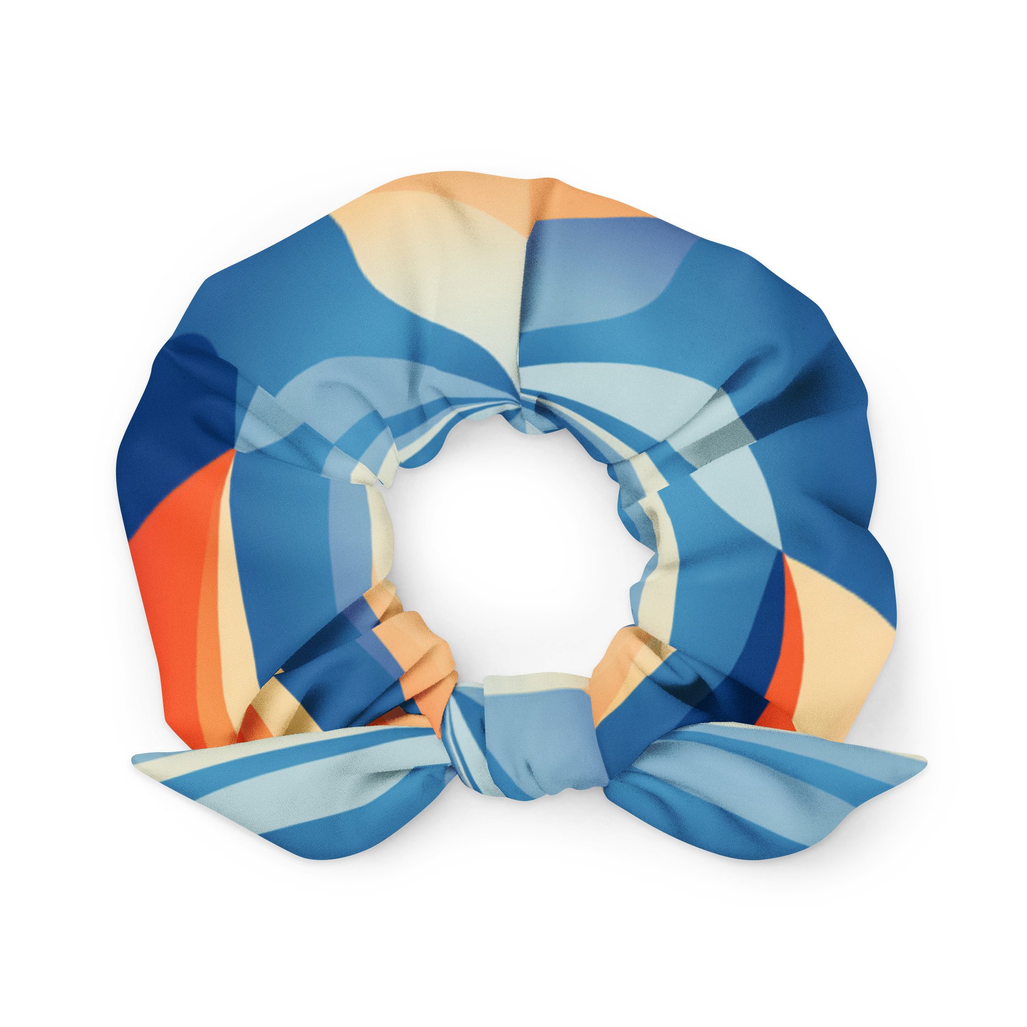 Soft blue and peach striped eco-friendly scrunchie with removable bow, evoking a coastal vibe.