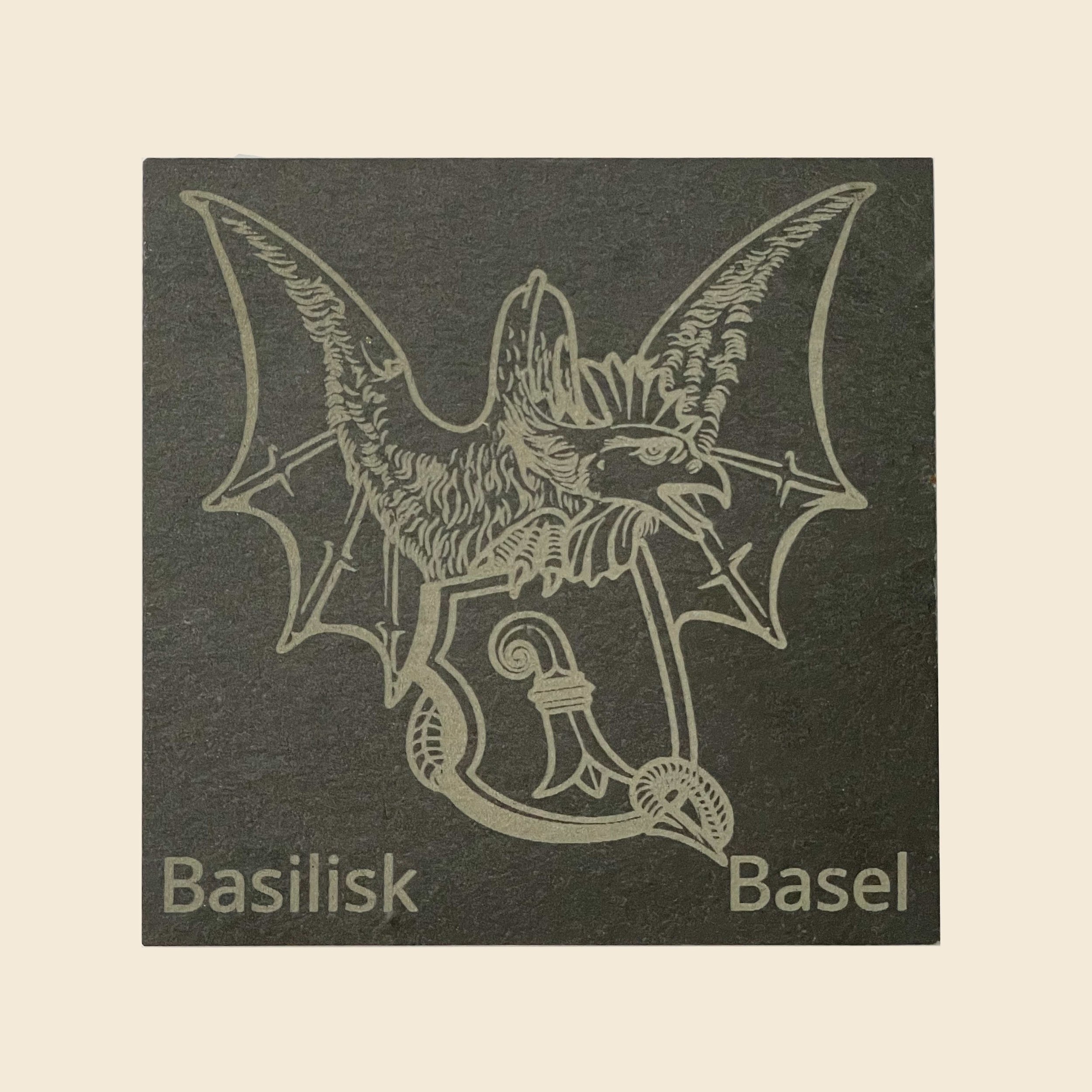 Slate coaster with an engraving of the Basilisk of Basel