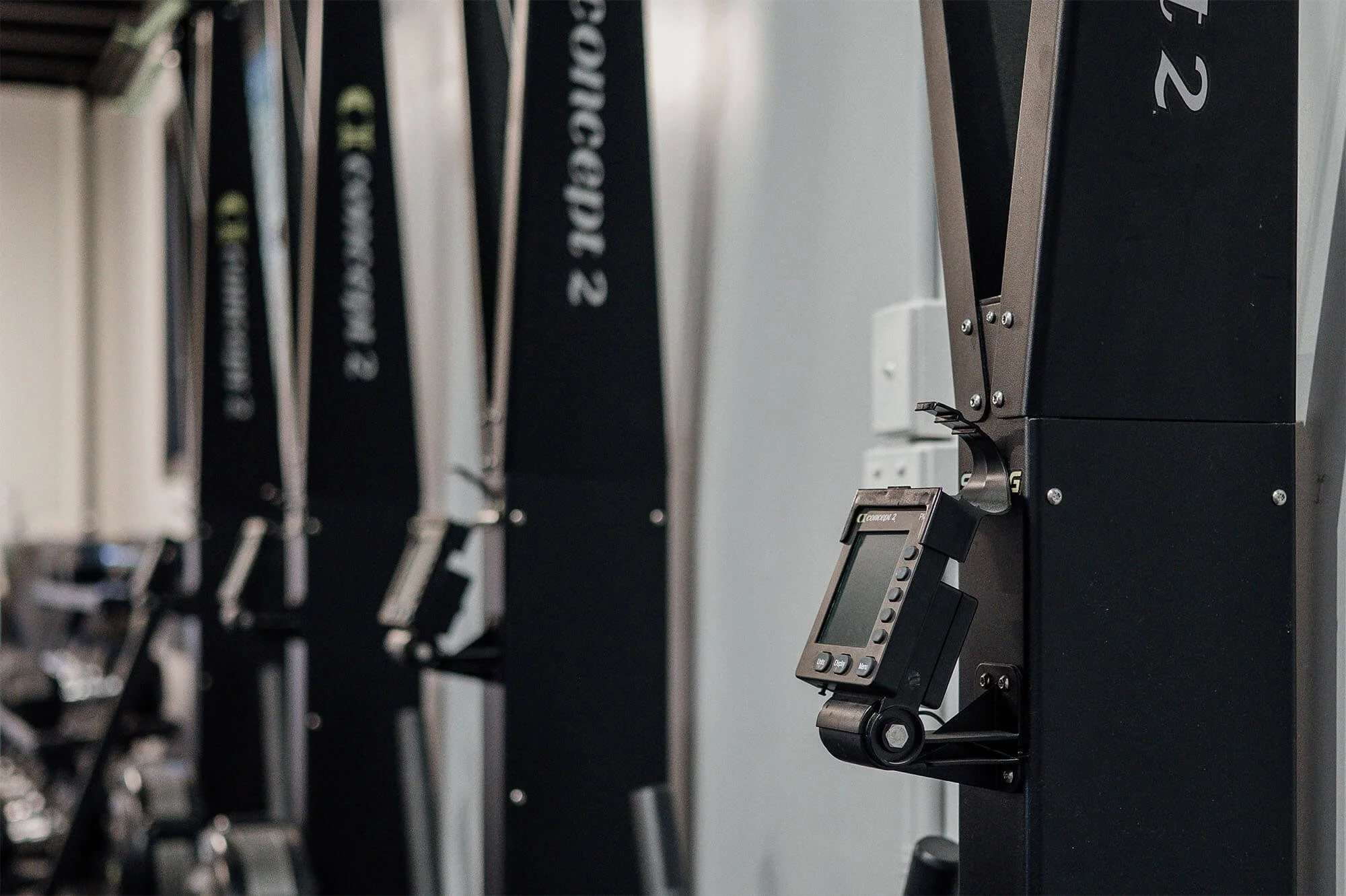 A close up photo of the numerous ski ergs at CrossFit TARIS.