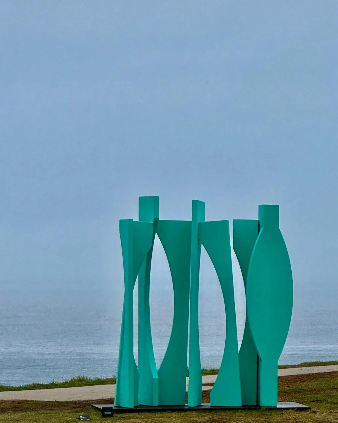 There&rsquo;s something about this sculpture &mdash; the way it frames the ocean and sky, how its curves echo the horizon.

The turquoise feels alive here, almost breathing with the sea. Standing within it, you sense both movement and stillness, th