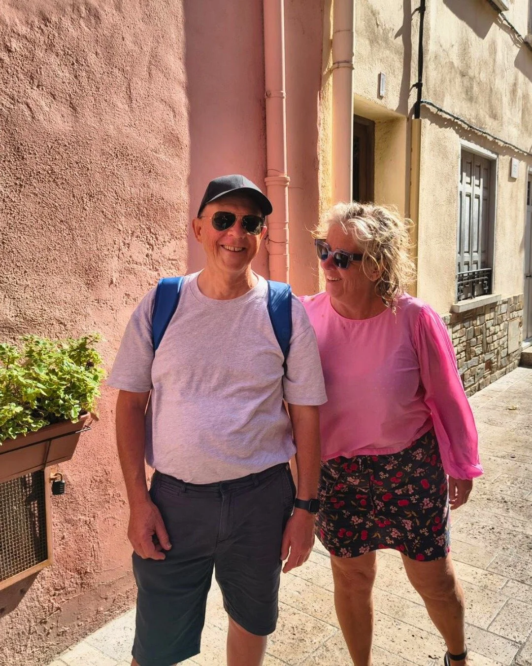 A moment from Europe &mdash; walking sunlit streets with Peter, surrounded by colour, flowers, and that feeling of simply being present.

Travel always reminds me how beauty lives in small things &mdash; a laugh, a shared glance, the light on old w
