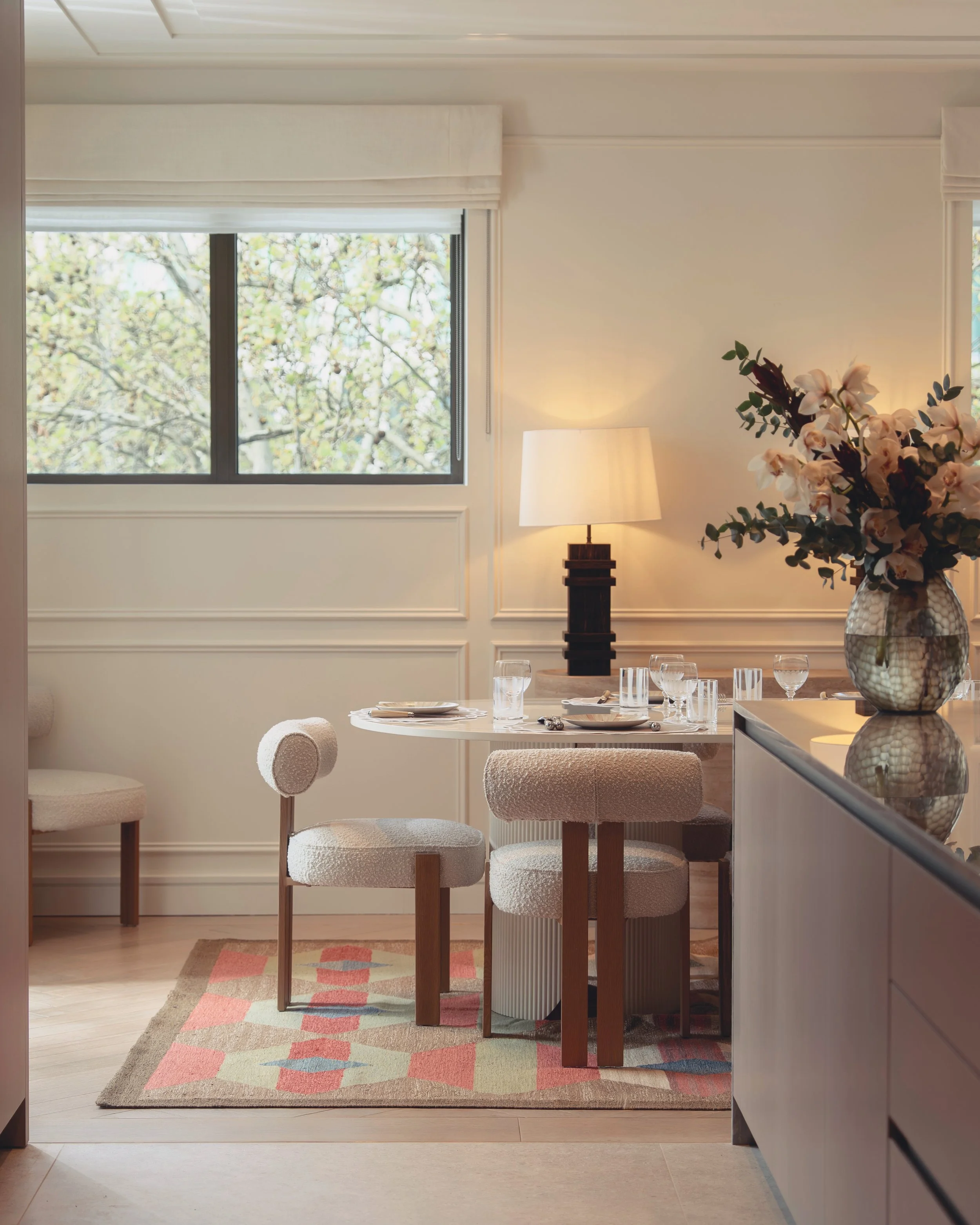 Kitchen dining area with treetop views in Residence 82 at Holland Park Gate, Kensington, London