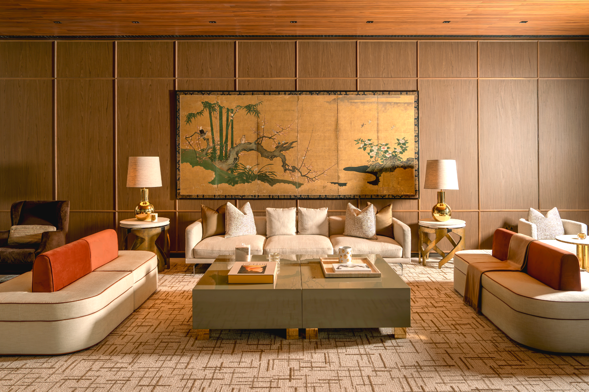 Oak-panelled residents' lobby lounge with gold Japanese screen painting at Holland Park Gate, Kensington, London