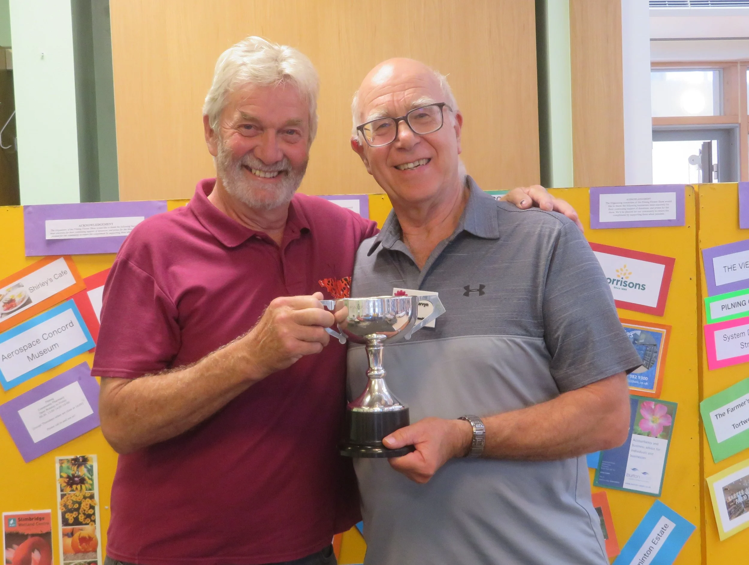 Steve Moorlen of Moments awarding cuo to Mervyn Reeves.JPG