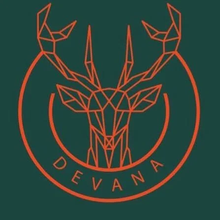 A geometric line art illustration of a deer's head with antlers in orange, enclosed in a circle with the word "DEVANA" underneath.