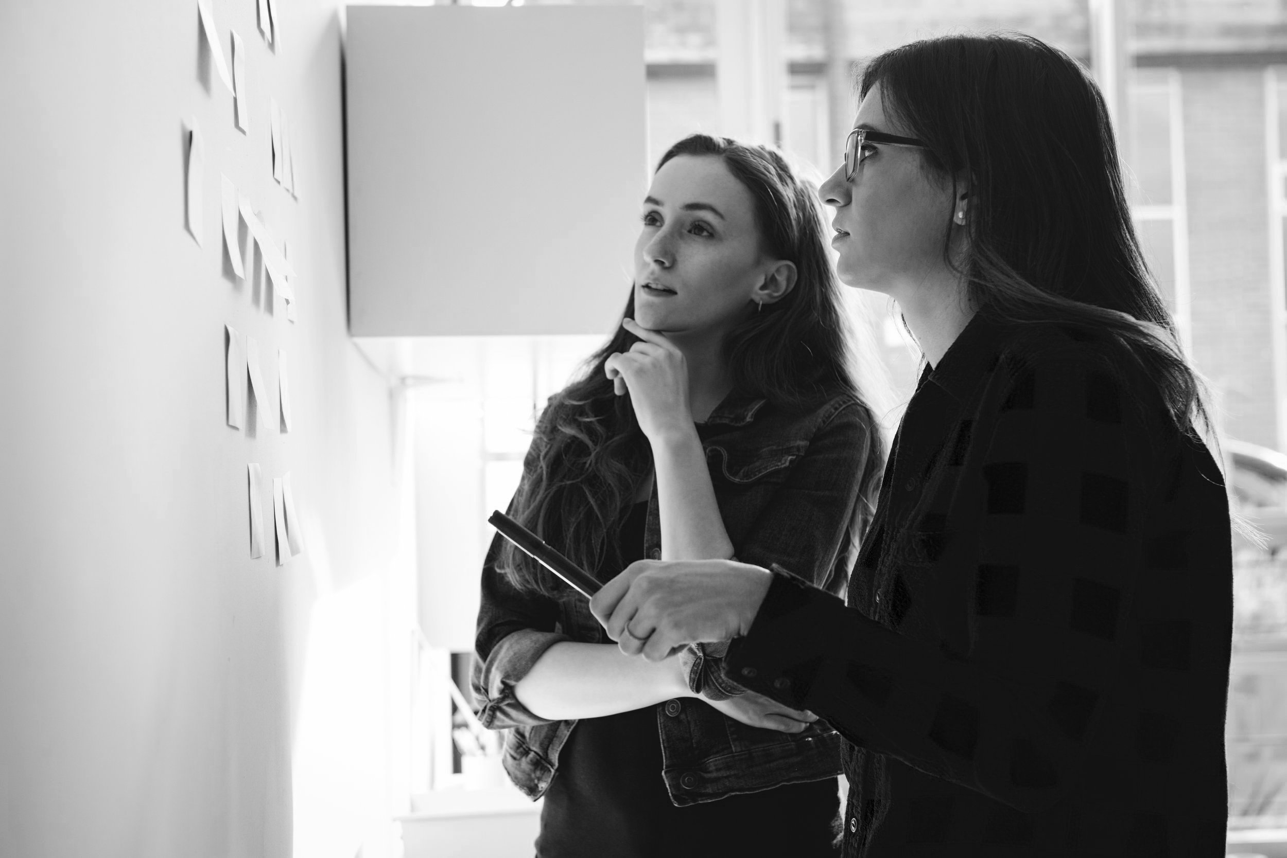 Two women engaged in a workshop
