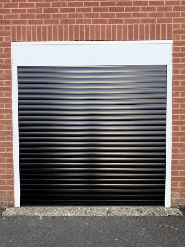 black roller shutter garage doors