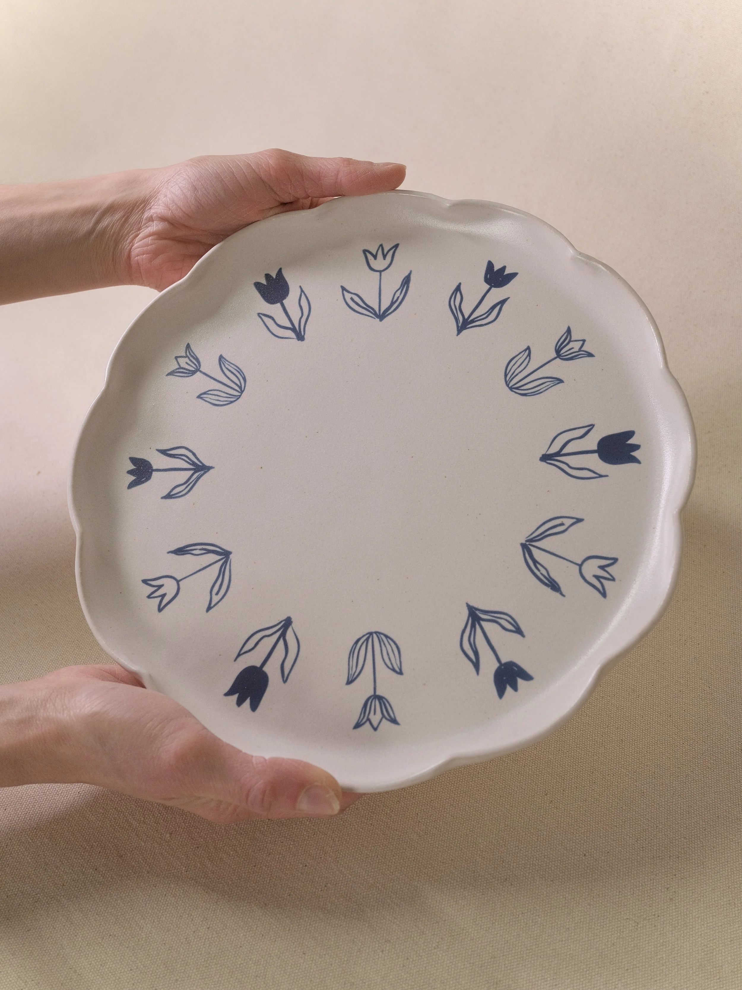 Little Fire Ceramics_Aly Miller_Illustrated Tulip Plate_In Hands.JPG