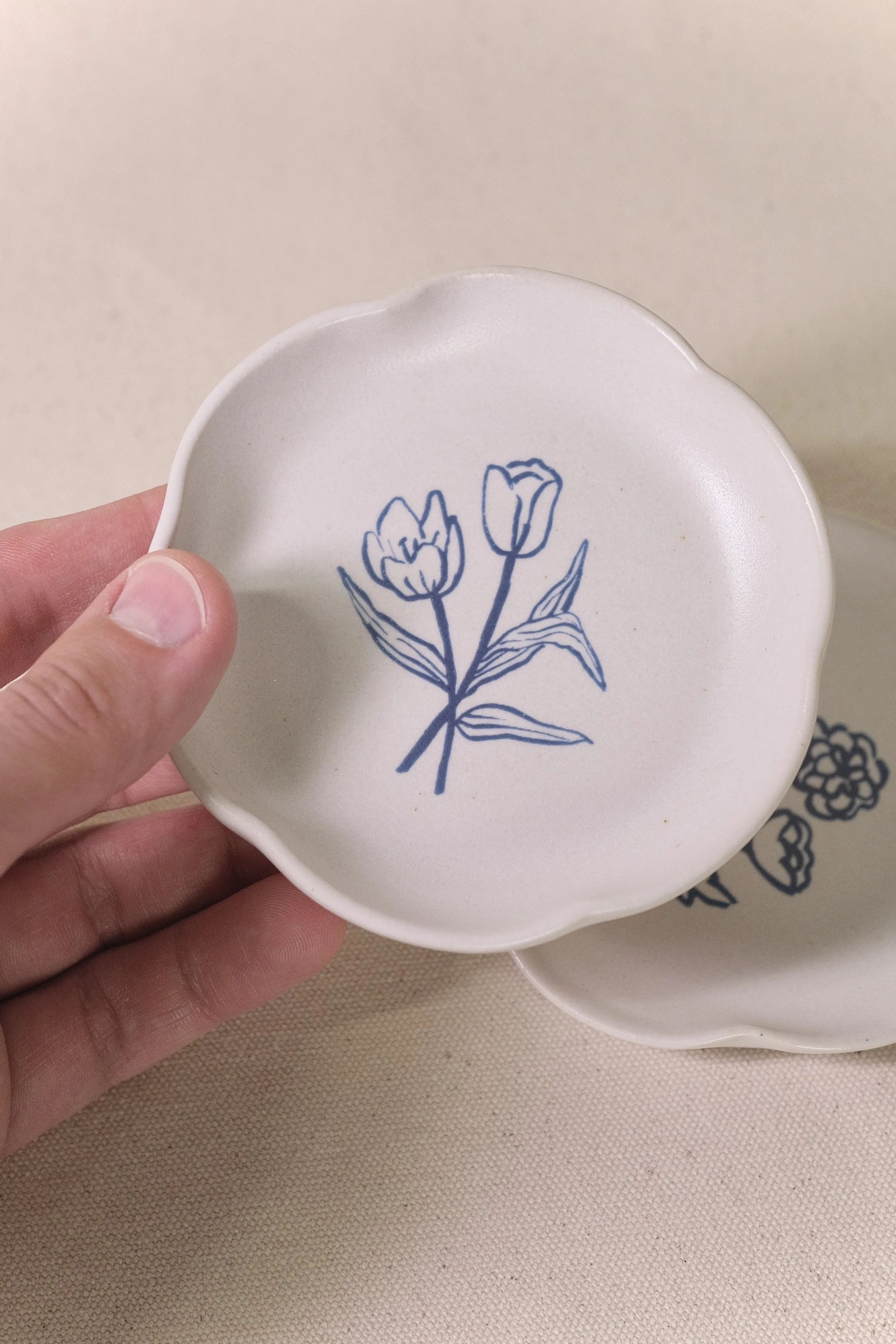 Little Fire Ceramics_Aly Miller_Illustrated Tulip Plate_In Hand.jpeg
