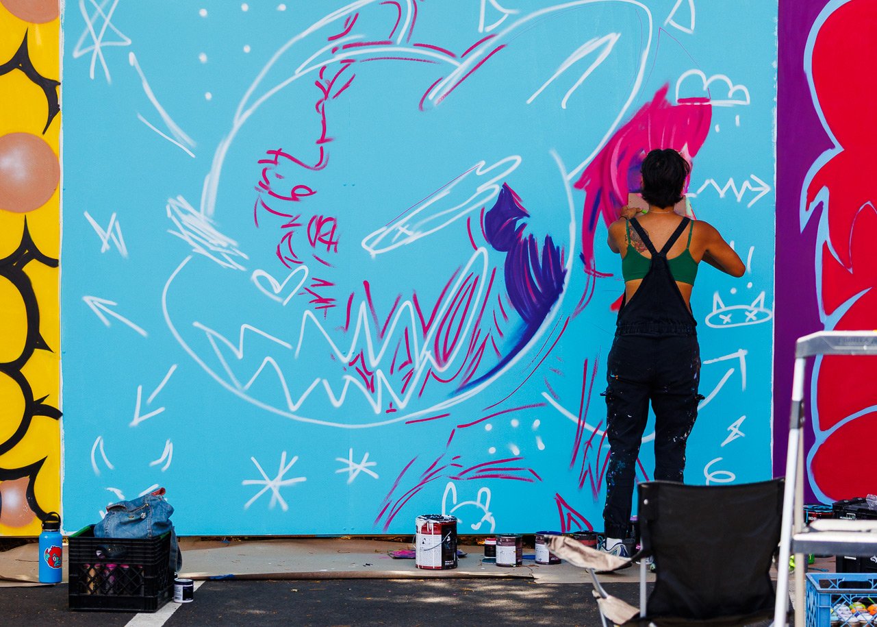 Outdoor art gallery mural wall at The Art Yard in East Atlanta Village.